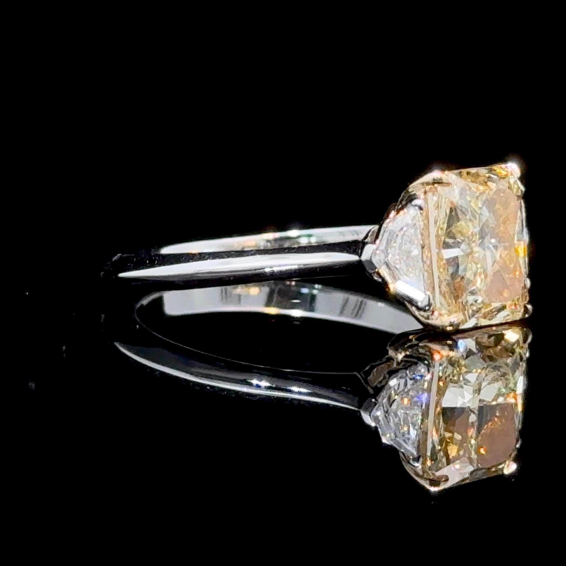 GIA Certified 2.16 Radiant Cut Fancy Yellow Diamond 3 Stone Ring In New Condition For Sale In New York, NY