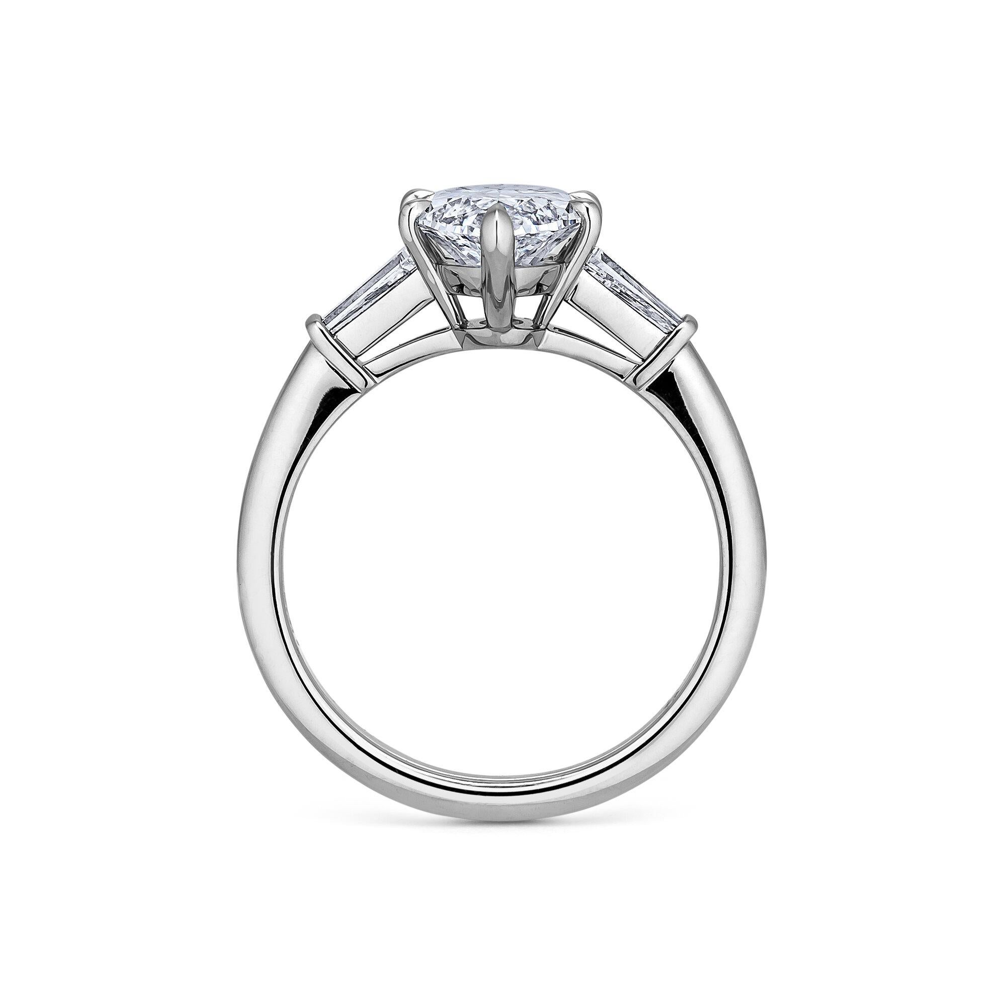 This sizzling 2.18 marquise brilliant cut diamond engagement ring will always keep your inner fire going.  With an exceptional color, this dazzling marquise center set diamond is perfectly proportioned and a true show stopper.  Center stone GIA