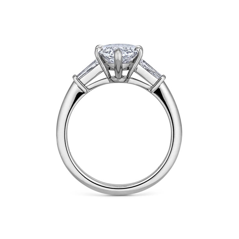 This sizzling 2.18 marquise brilliant cut diamond engagement ring will always keep your inner fire going.  With an exceptional color, this dazzling marquise center set diamond is perfectly proportioned and a true show stopper.  Center stone GIA