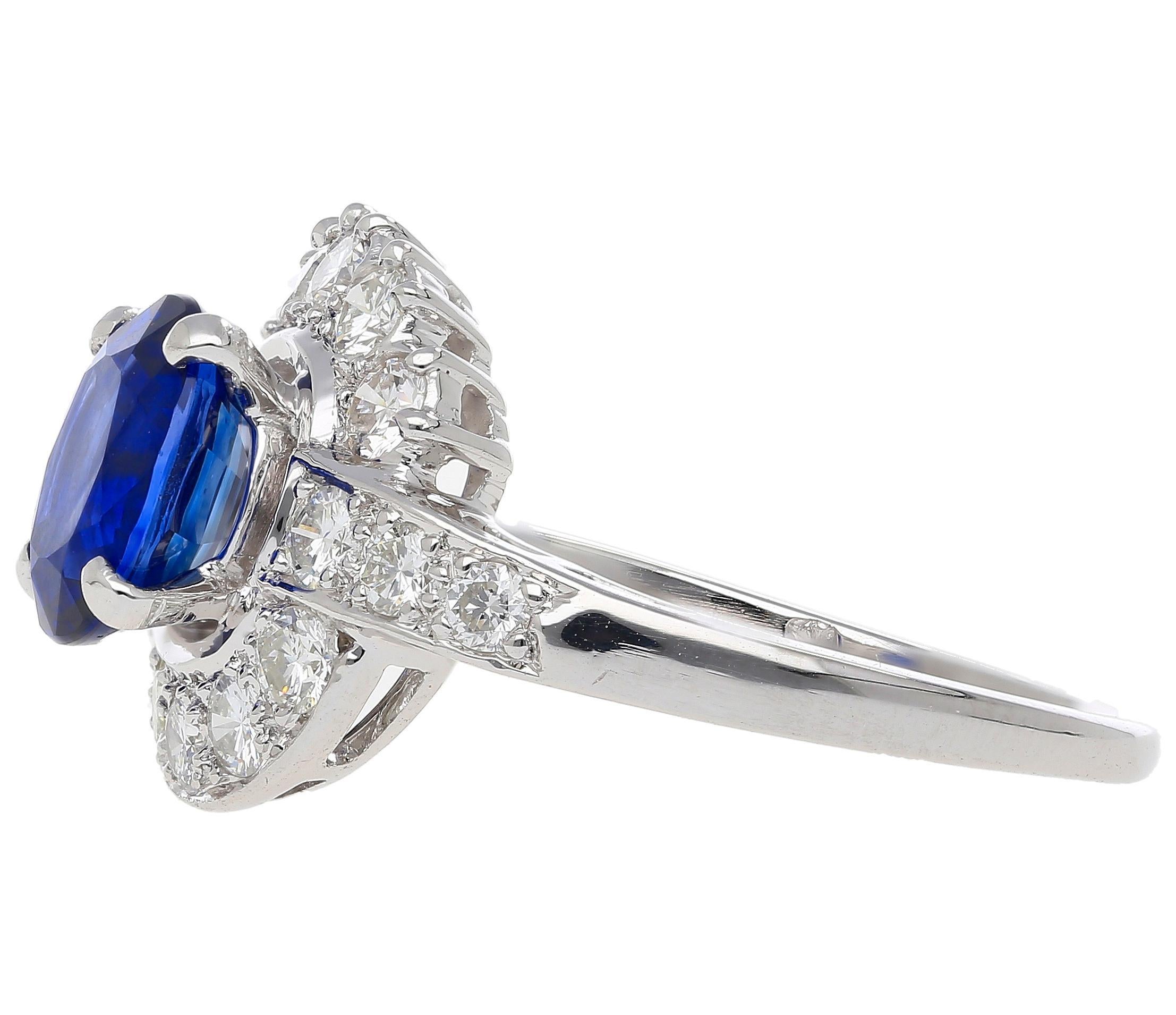 Women's GIA Certified 2.18 Carat Oval Blue Sapphire & Diamond Platinum Bypass Halo Ring For Sale