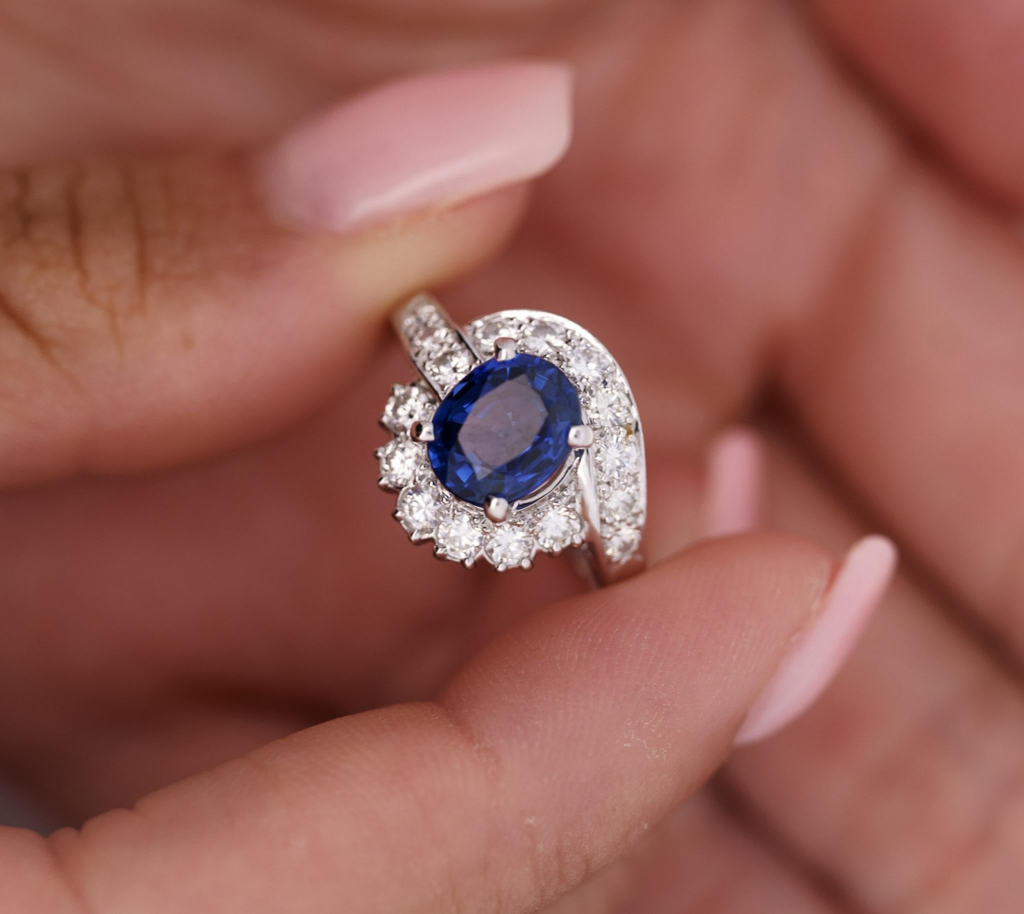 GIA Certified 2.18 Carat Oval Blue Sapphire & Diamond Platinum Bypass Halo Ring For Sale 2