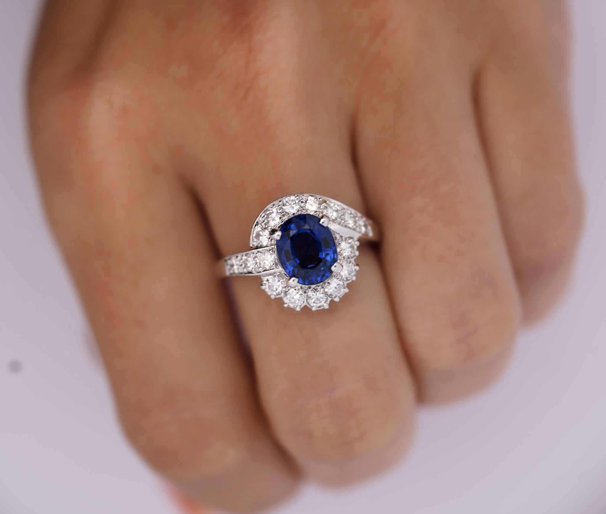 GIA Certified 2.18 Carat Oval Blue Sapphire & Diamond Platinum Bypass Halo Ring For Sale 3