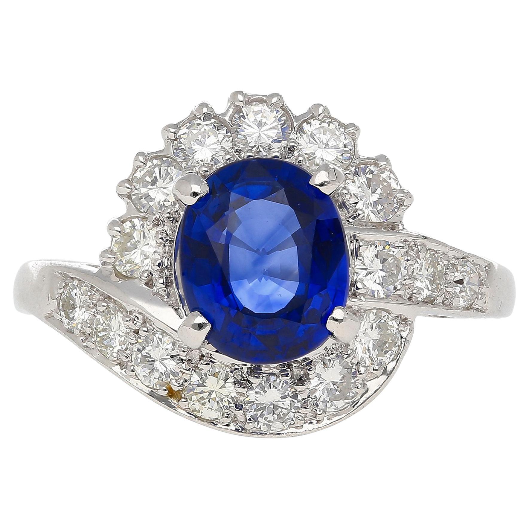 GIA Certified 2.18 Carat Oval Blue Sapphire & Diamond Platinum Bypass Halo Ring