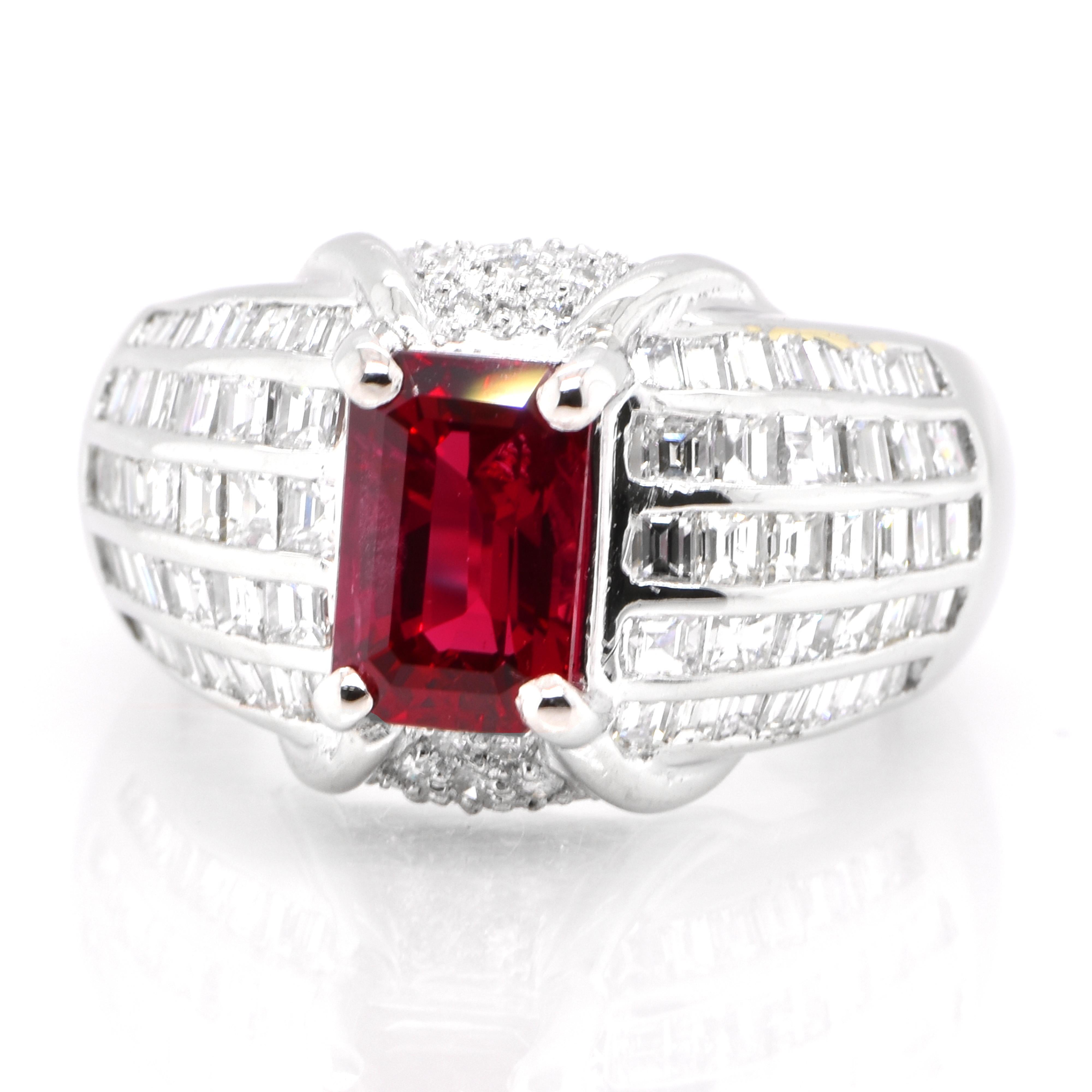 A beautiful Vintage Estate ring set in Platinum featuring a GIA Certified 2.18 Carat Natural Siam (Thailand) Ruby and 1.96 Carat Diamonds. Rubies are referred to as 