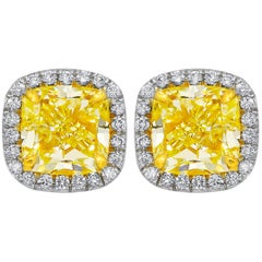 GIA Certified 2.19 Carat Yellow Diamond Stud Earrings