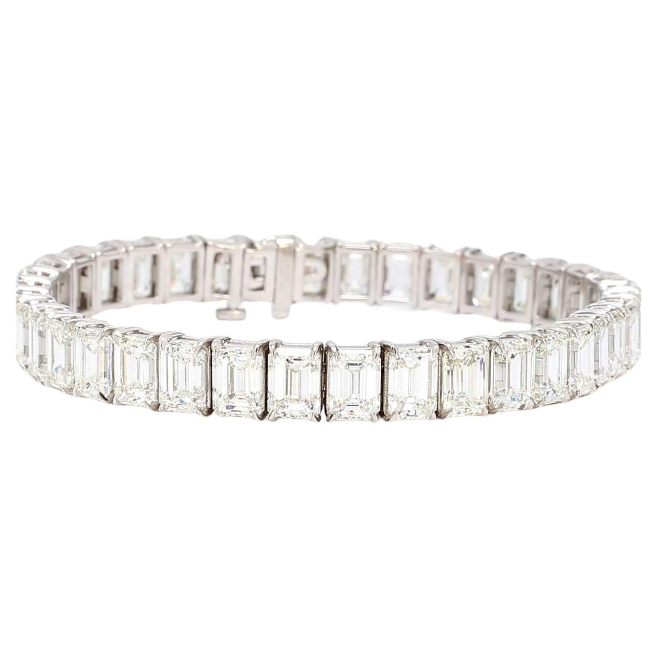 7' Platinum Tennis Bracelet adorned with 45 emerald cut diamonds, each meticulously set in a 4-prong claw basket. Every diamond is GIA certified, ensuring exceptional quality and brilliance.

Crafted in luxurious platinum, this timeless piece exudes
