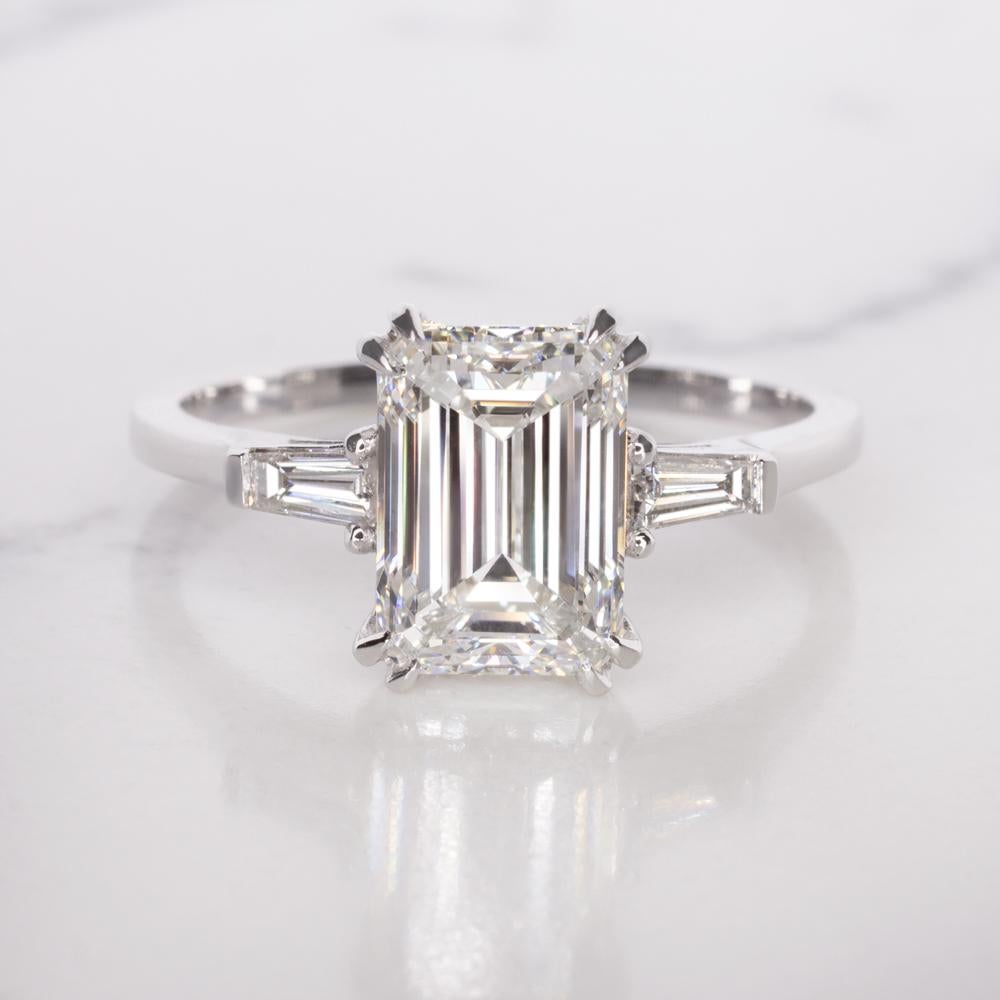 Modern GIA Certified 2.2 Carat Emerald Cut 'main stone' Diamond Ring For Sale