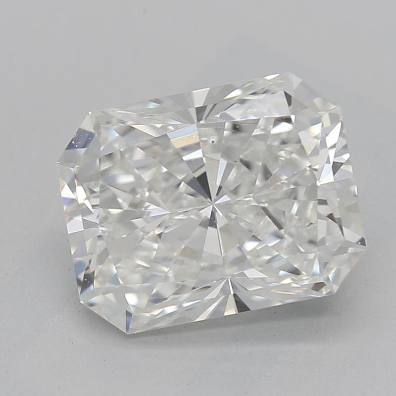 Handcrafted in New York, this exquisite diamond ring features a captivating centerpiece of a radiant diamond weighing 2.2 , renowned for its exceptional G and VS2. Secured in an ornate four-prong setting, this dazzling stone is surrounded by an