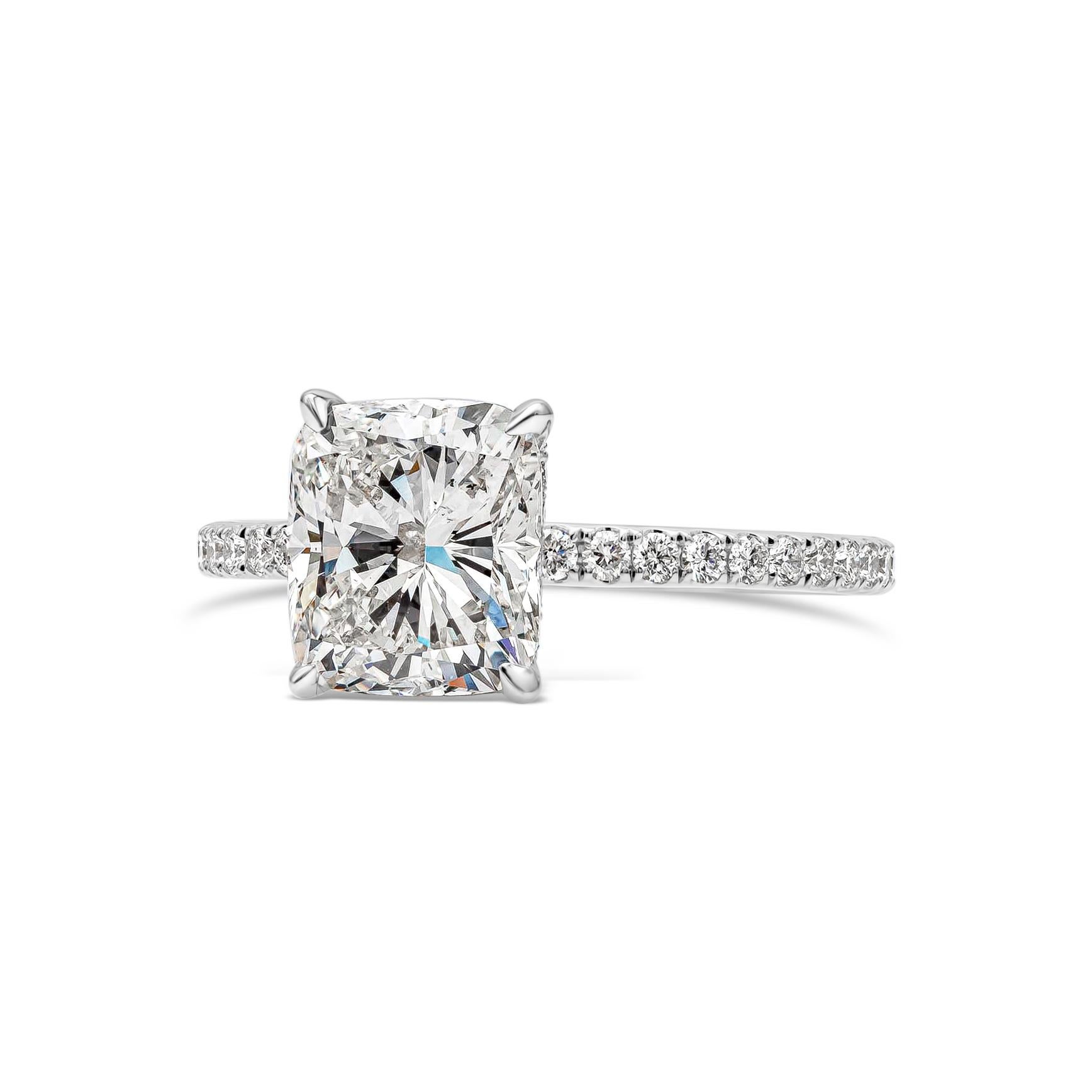 Features a 2.20 carats cushion cut diamond certified by GIA as G color, SI2 in clarity, set in a diamond encrusted band made in 18k white gold. Accent diamonds weigh 0.47 carats total. Size 6.75 US resizable upon request.

Style available in