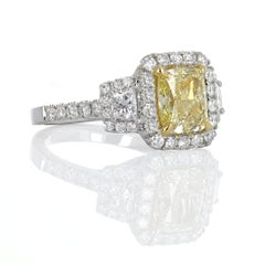 GIA Certified, 2.20 Carat Fancy Light Yellow Diamond Ring