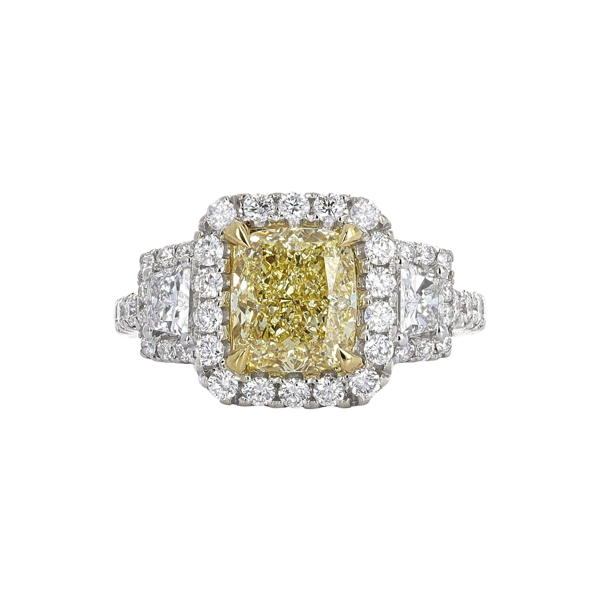 GIA Certified, 2.20 Carat Fancy Light Yellow Diamond Ring