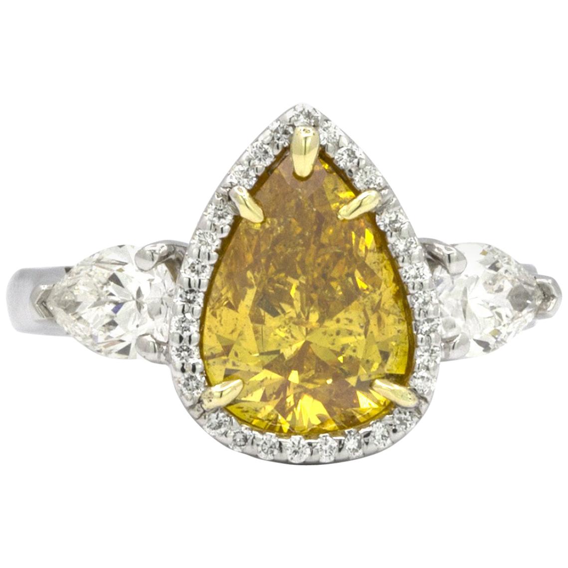 GIA Certified 2.20 Carat Vivid Yellow-Orange Pear Shape Diamond Ring For Sale