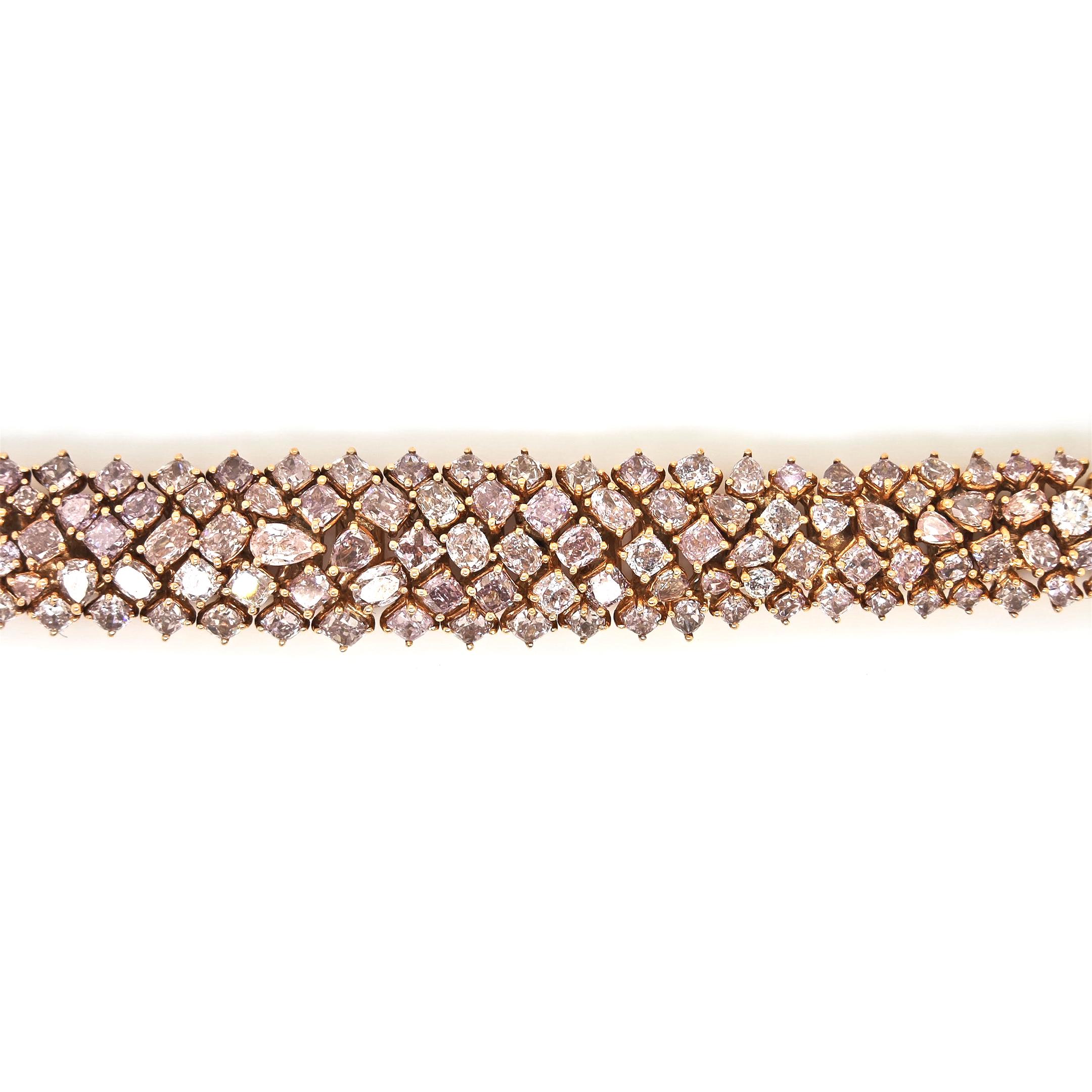 195 Fancy Diamonds: 22.07 Carats
Metal: 18K Rose Gold, 40.60 Grams
GIA: Certificate # 2225603124
