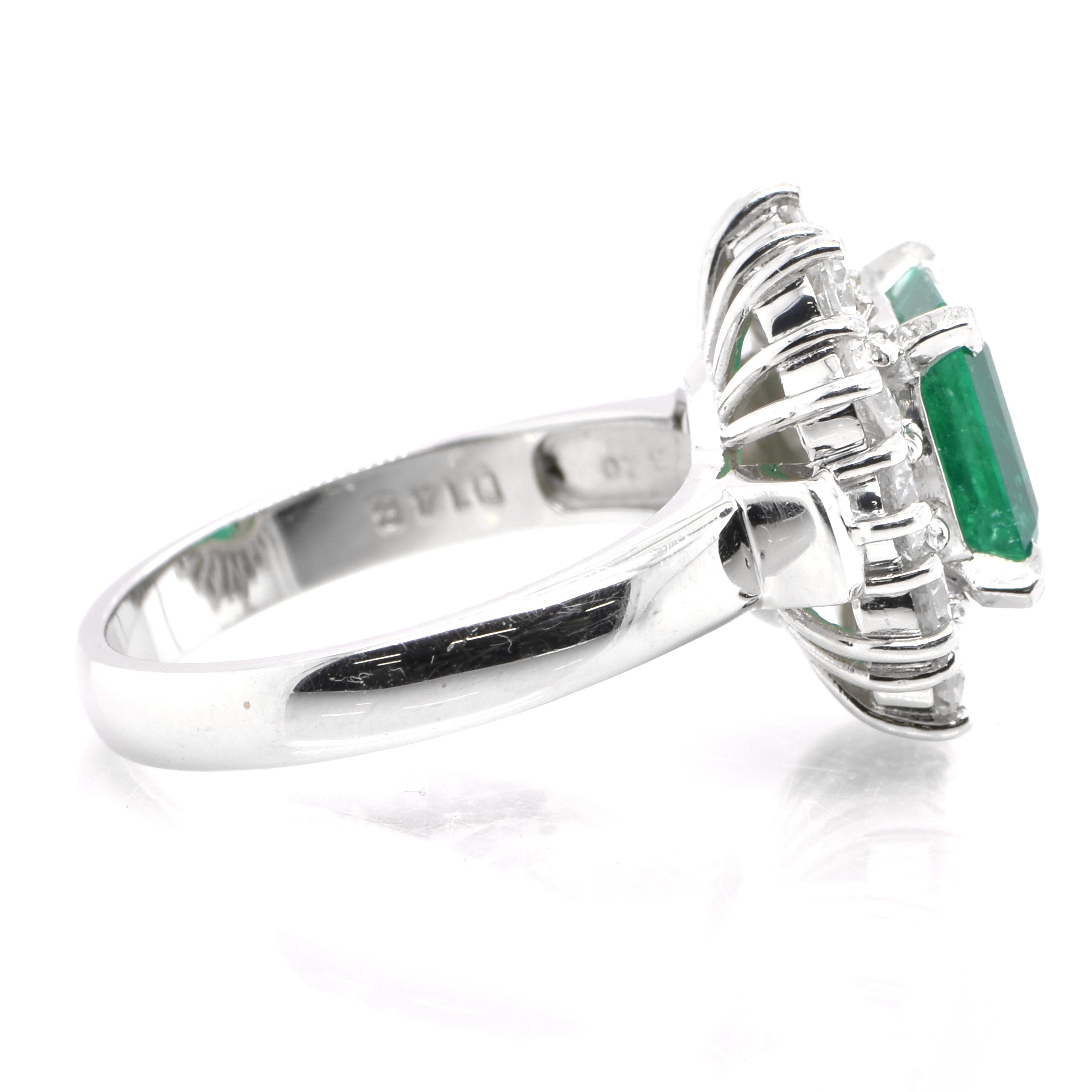 Modern GIA Certified 2.21 Carat Natural Emerald and Diamond Halo Ring Set in Platinum