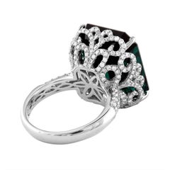 Anillo de oro con turmalina verde azulada oscura y diamantes, certificado por el GIA, de 22,17 quilates
