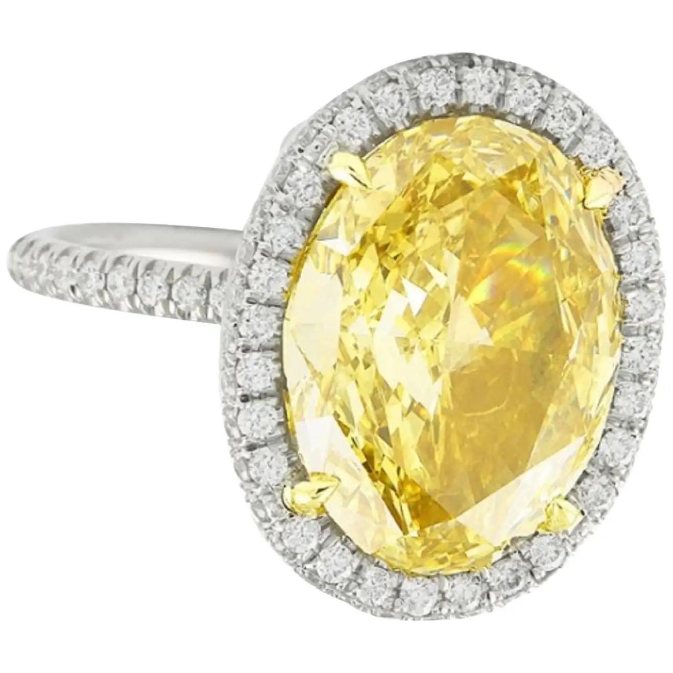 Modern GIA Certified 2.22 Carat Fancy Yellow Oval Diamond Ring