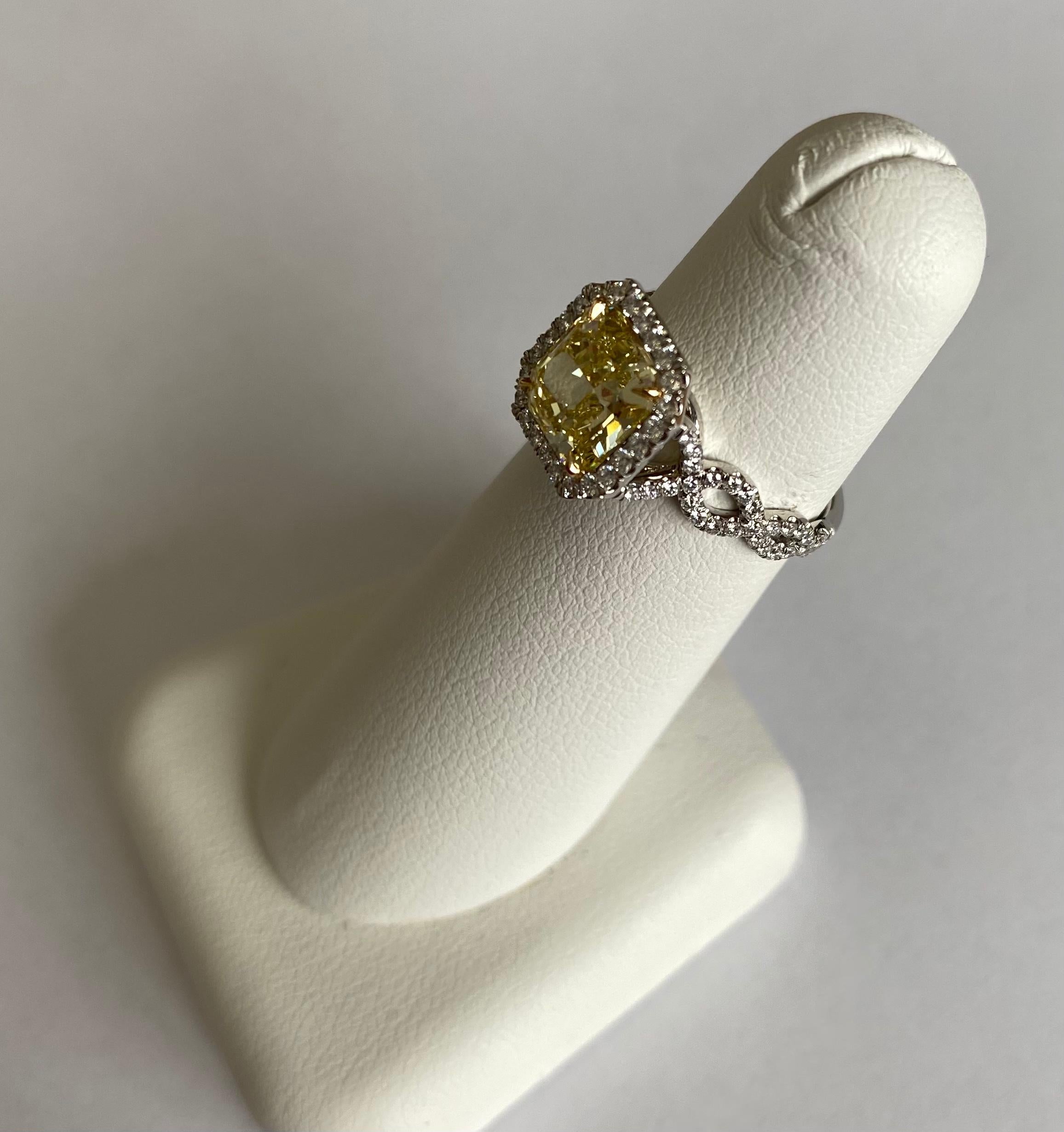 Radiant Cut GIA Certified 2.23 Carats Fancy Intense Yellow Diamond Ring For Sale
