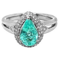 Anillo de oro blanco con turmalina paraiba y diamantes de 2,24 quilates certificado por GIA