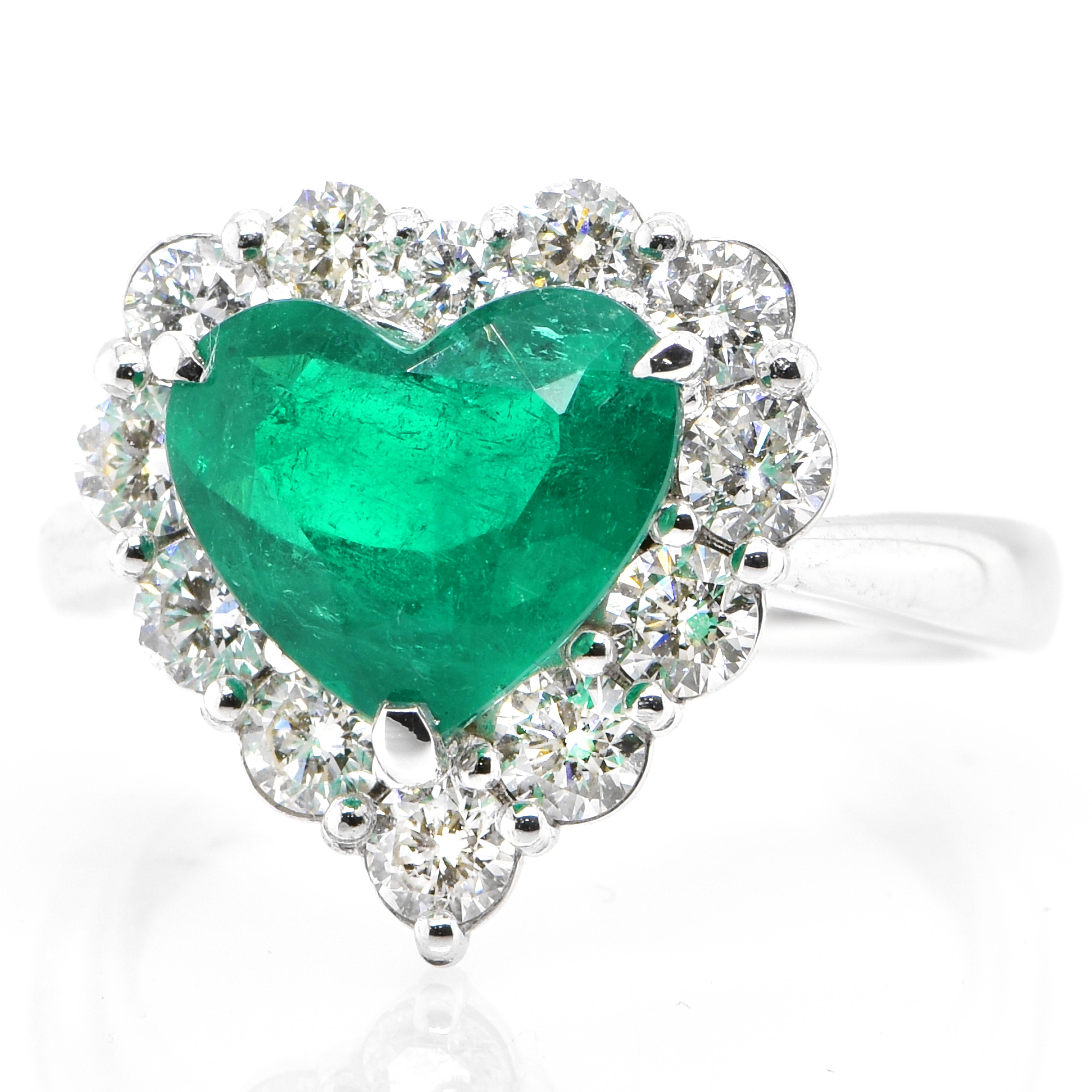 A stunning ring featuring a GIA Certified 2.25 Carat Natural Colombian, Minor Oiled Emerald and 1.02 Carats of Diamond Accents set in Platinum. People have admired emerald’s green for thousands of years. Emeralds have always been associated with the