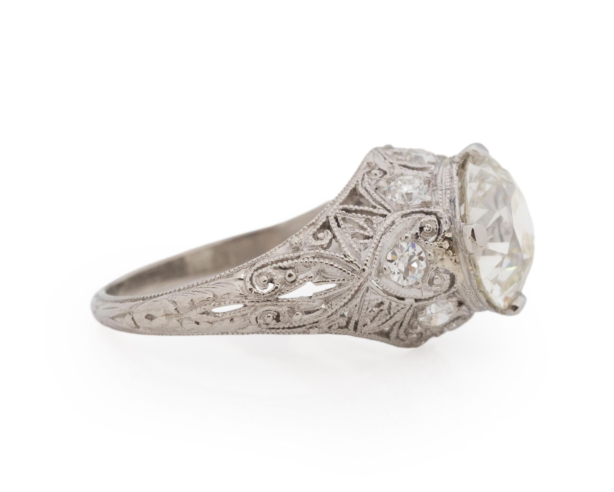 Ring Size: 4.75
Metal Type: Platinum [Hallmarked, and Tested]
Weight: 3.0 grams

Center Diamond Details:
GIA REPORT #:5222191895
Weight: 2.26ct
Cut: Old European brilliant
Color: K
Clarity: I1
Measurements: 8.55mm x 8.32mm x 5.12mm

Side Stone