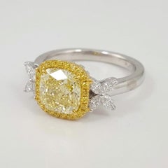 GIA Certified 2.26 Carat Cushion Cut Fancy Light Yellow Diamond Halo Ring