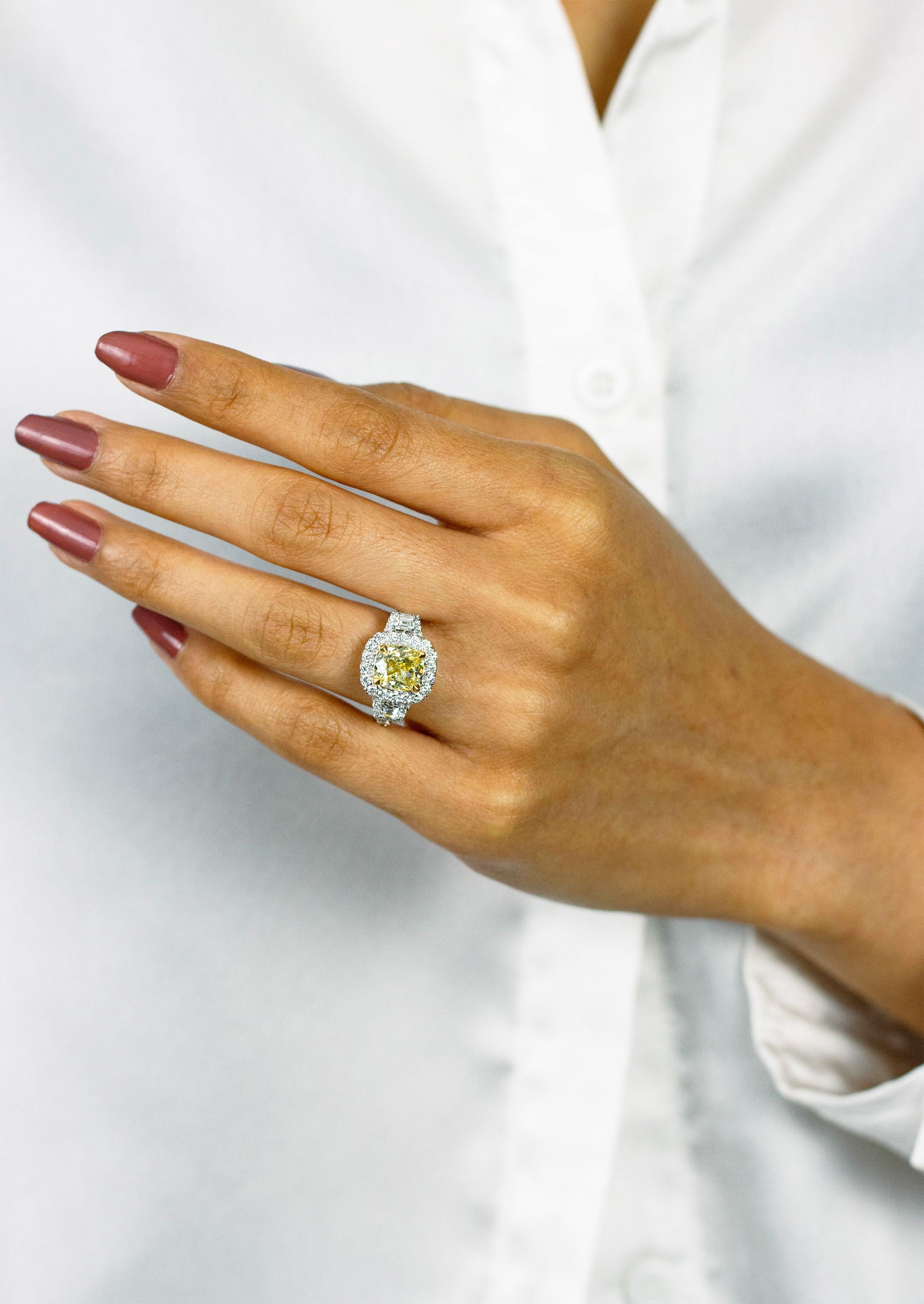 Women's GIA Certified 2.26 Carats Cushion Cut Fancy Yellow Diamond Halo Engagement Ring For Sale