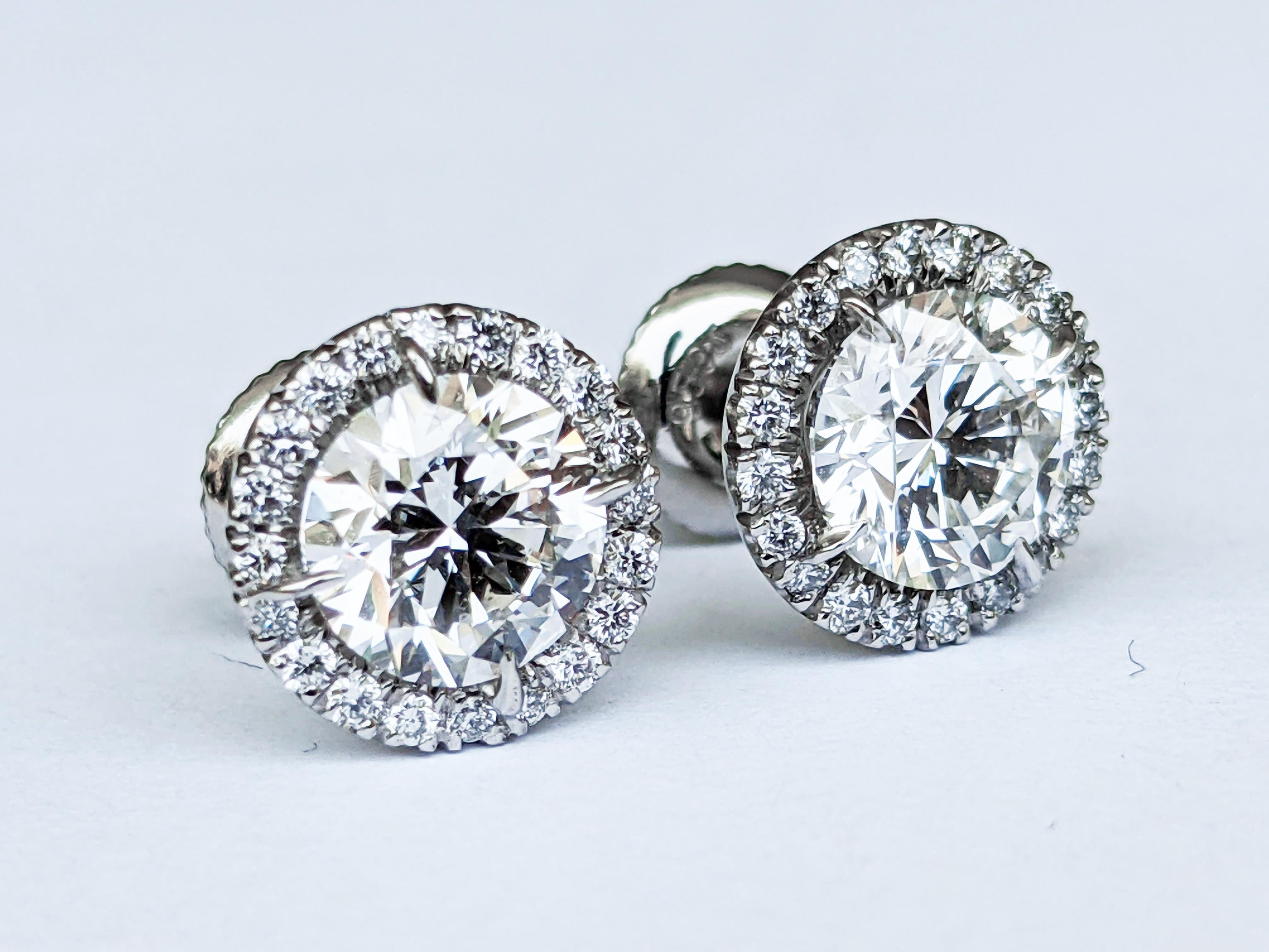 GIA Certified 2.4 Carat Diamonds Platinum Halo Stud Earrings Screw Back Post For Sale 1