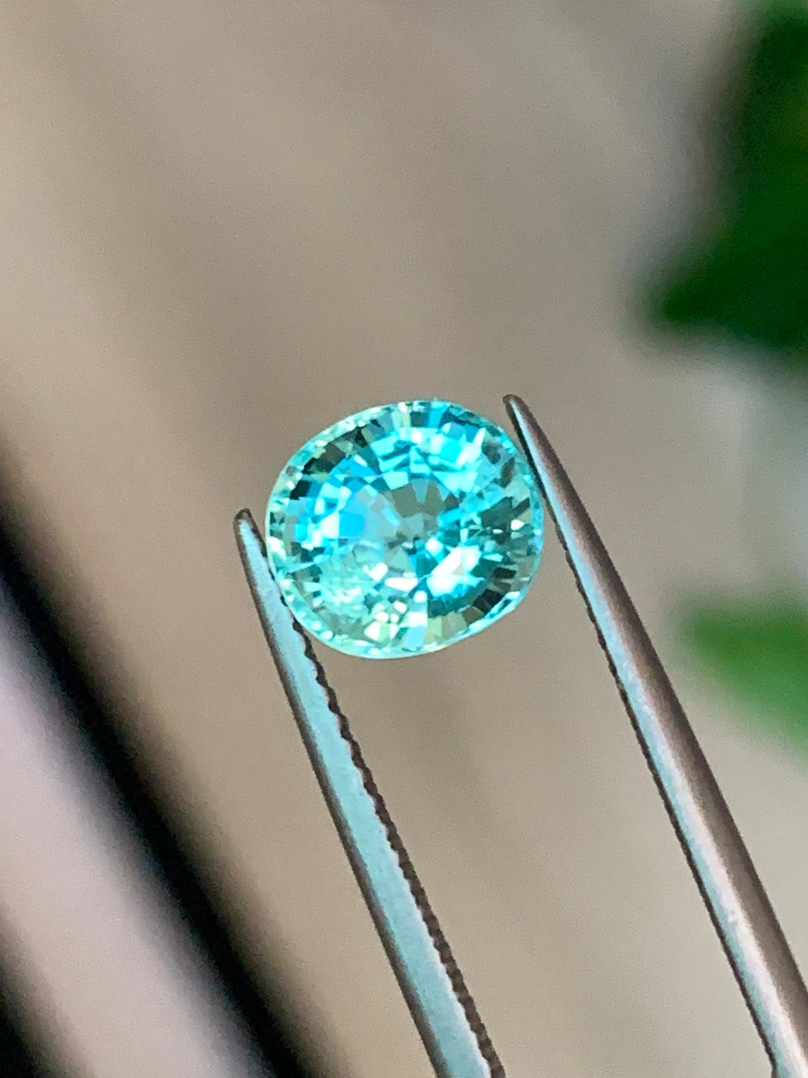 ITEM DESCRIPTION: 
Gem type : Tourmaline Paraiba
Origin: Mozambique
Treatment: Heated
Color: Blue-Green
shape: Oval
Size: 2.26 Carats

 Paraiba tourmaline is a rare and highly prized gemstone known for its vivid neon blue to greenish-blue hues. It
