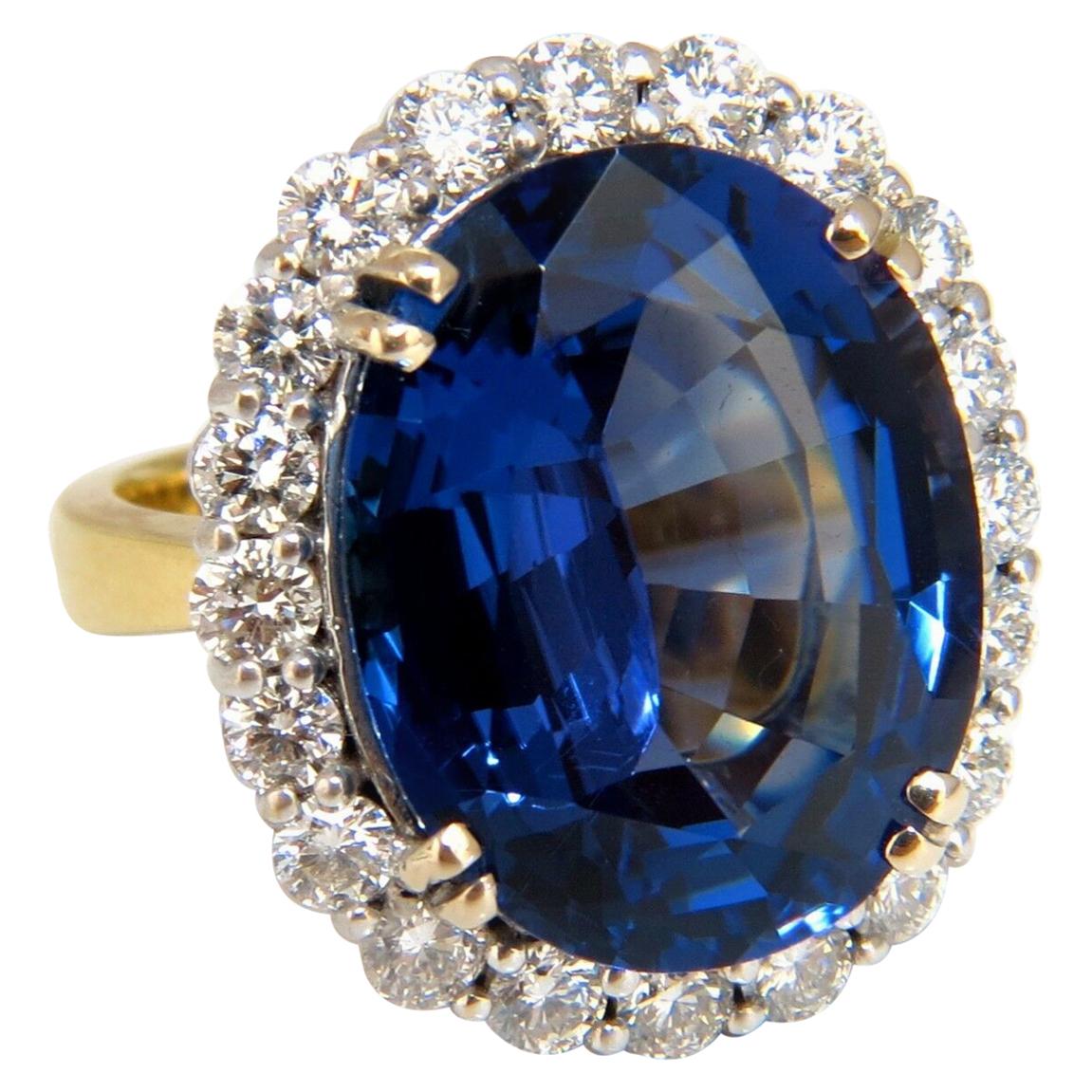 GIA Certified 22.61 Carat Natural Blue Tanzanite Diamonds Ring 18kt Halo Royale For Sale