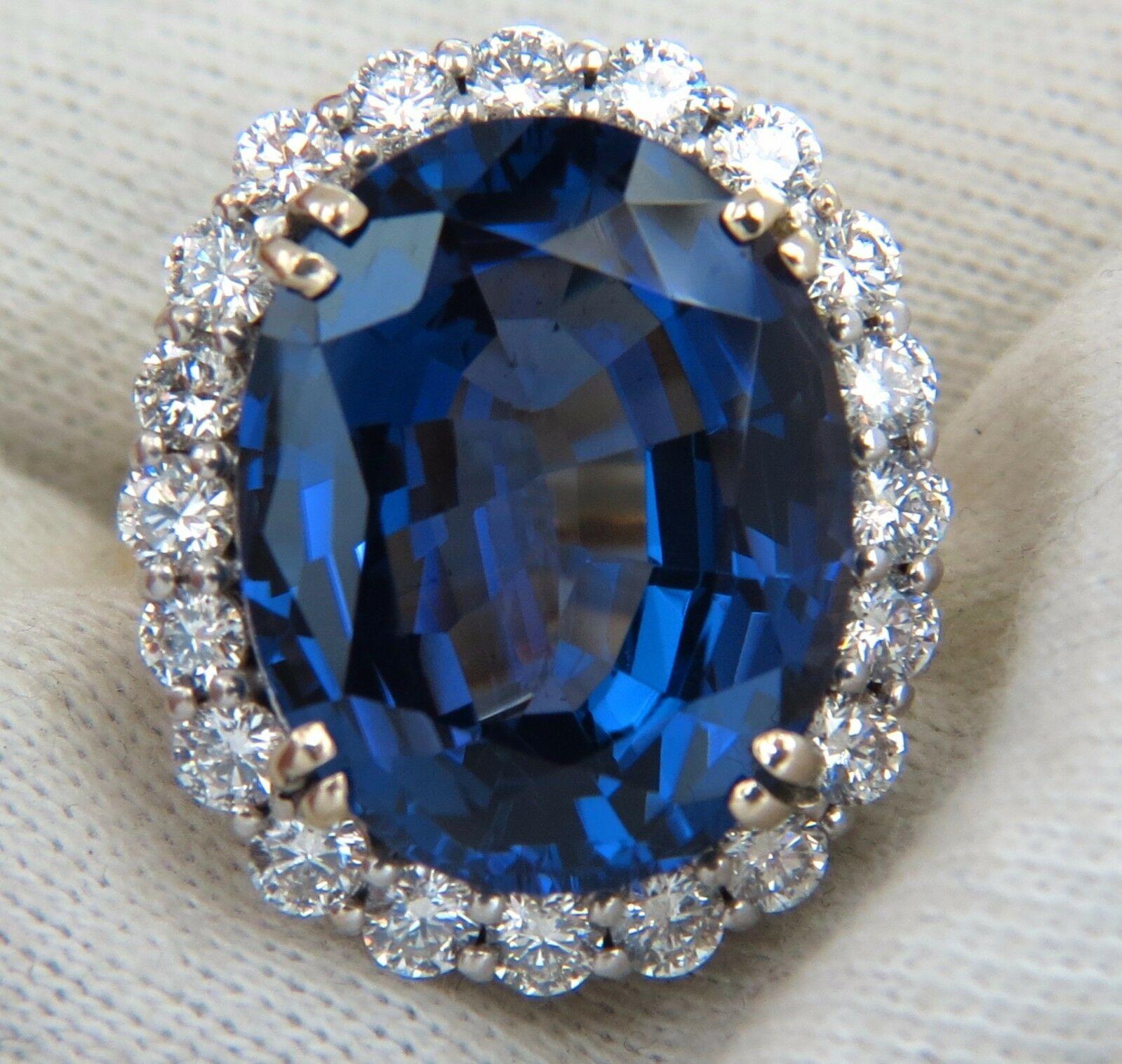 Oval Cut GIA Certified 22.61 Carat Natural Blue Tanzanite Diamonds Ring 18kt Halo Royale For Sale