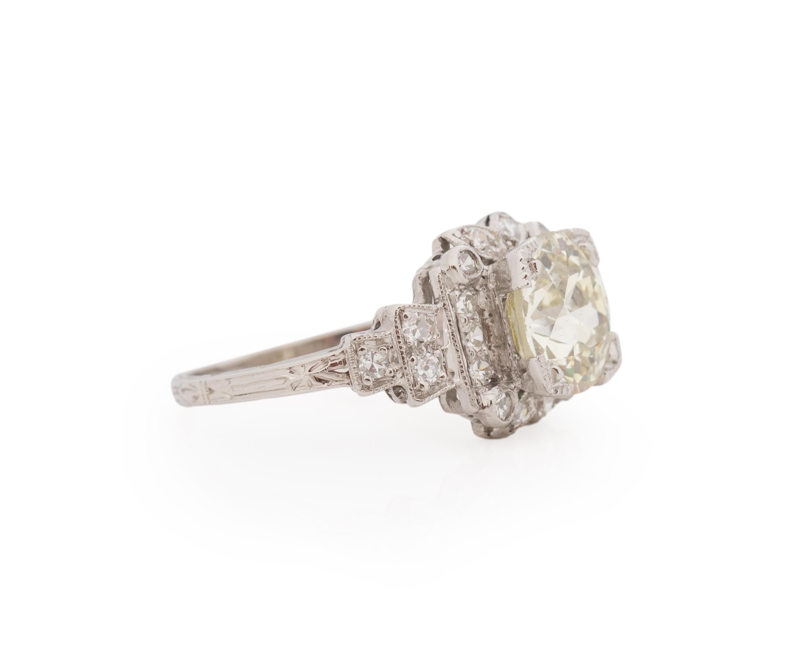 Ring Size: 6.25
Metal Type: Platinum [Hallmarked, and Tested]
Weight: 4.5 grams

Center Diamond Details:
GIA REPORT #: 1429369072
Weight: 2.27ct
Cut: Old European brilliant
Color: S-T (Light Yellow)
Clarity: SI1
Measurements: 8.29mm x 8.21mm x