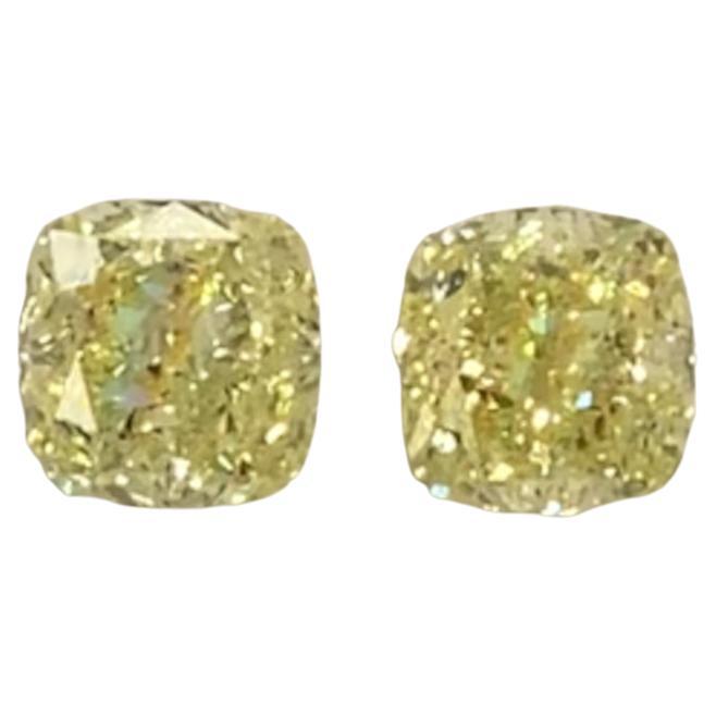 GIA Certified 2.20 Carat Cushion Cut Fancy Yellow Diamond Studs Earrings For Sale