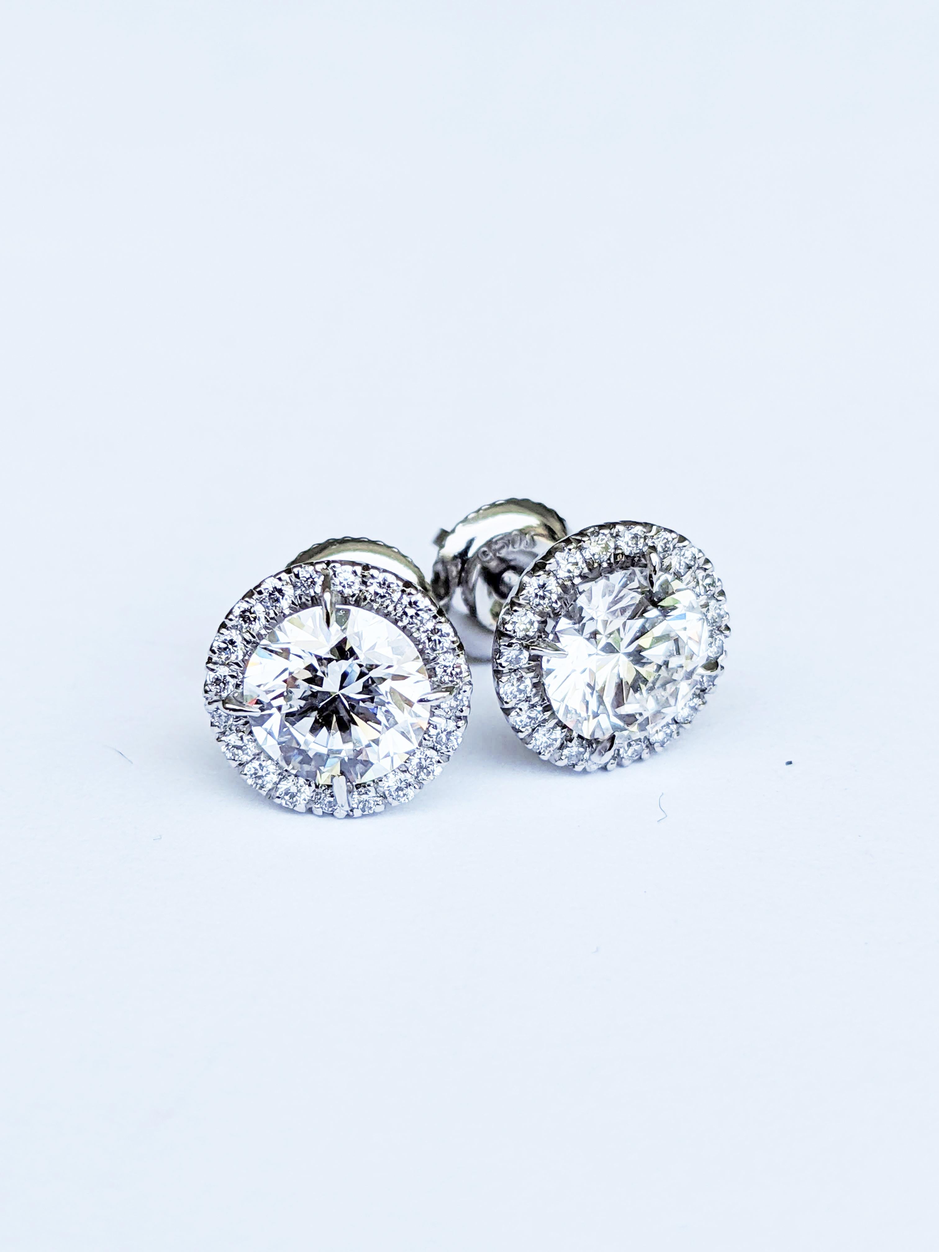 GIA Certified 2.27 Carat Diamonds Platinum Halo Stud Earrings Screw Back Post en vente 4