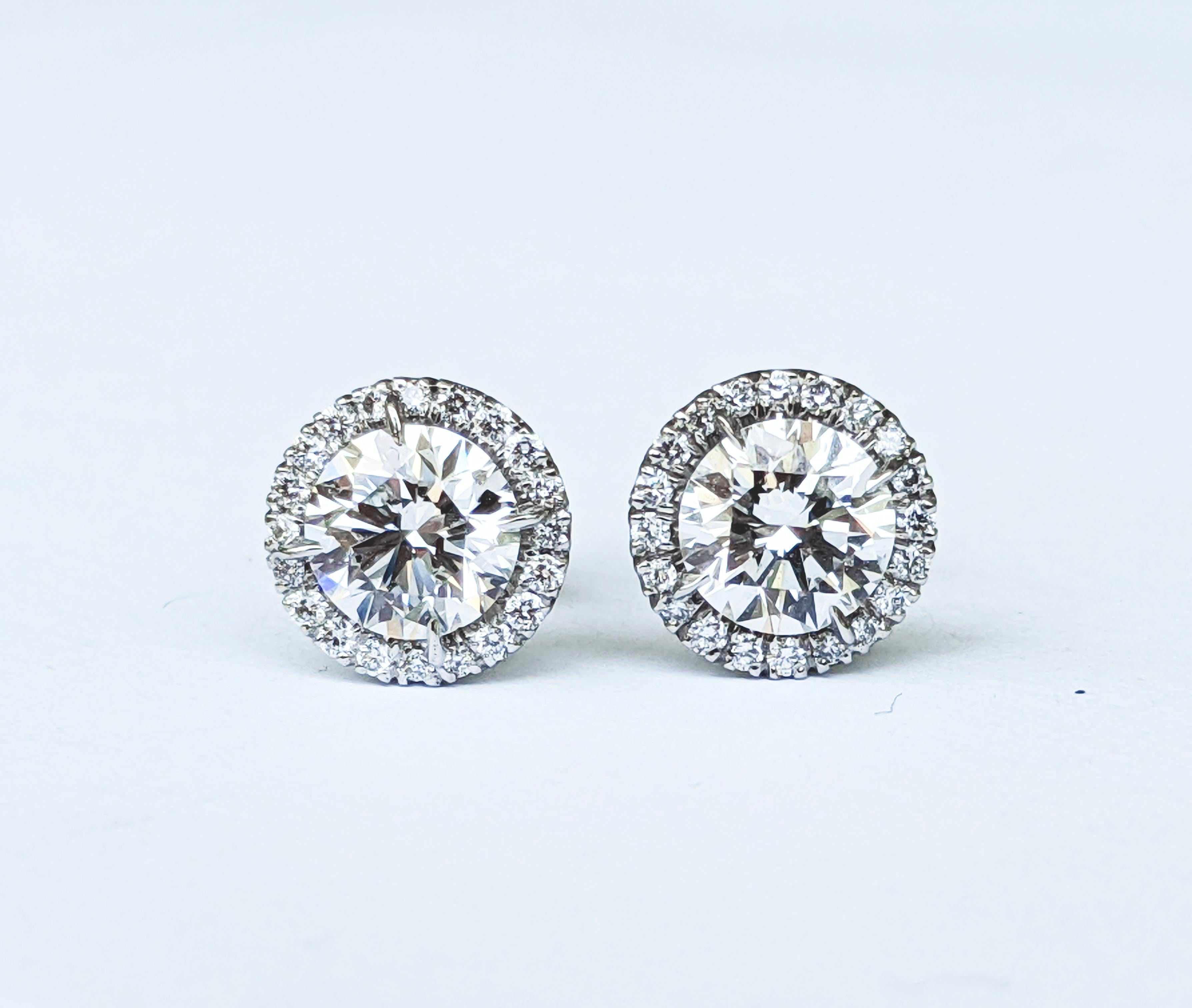 GIA Certified 2.27 Carat Diamonds Platinum Halo Stud Earrings Screw Back Post For Sale 1