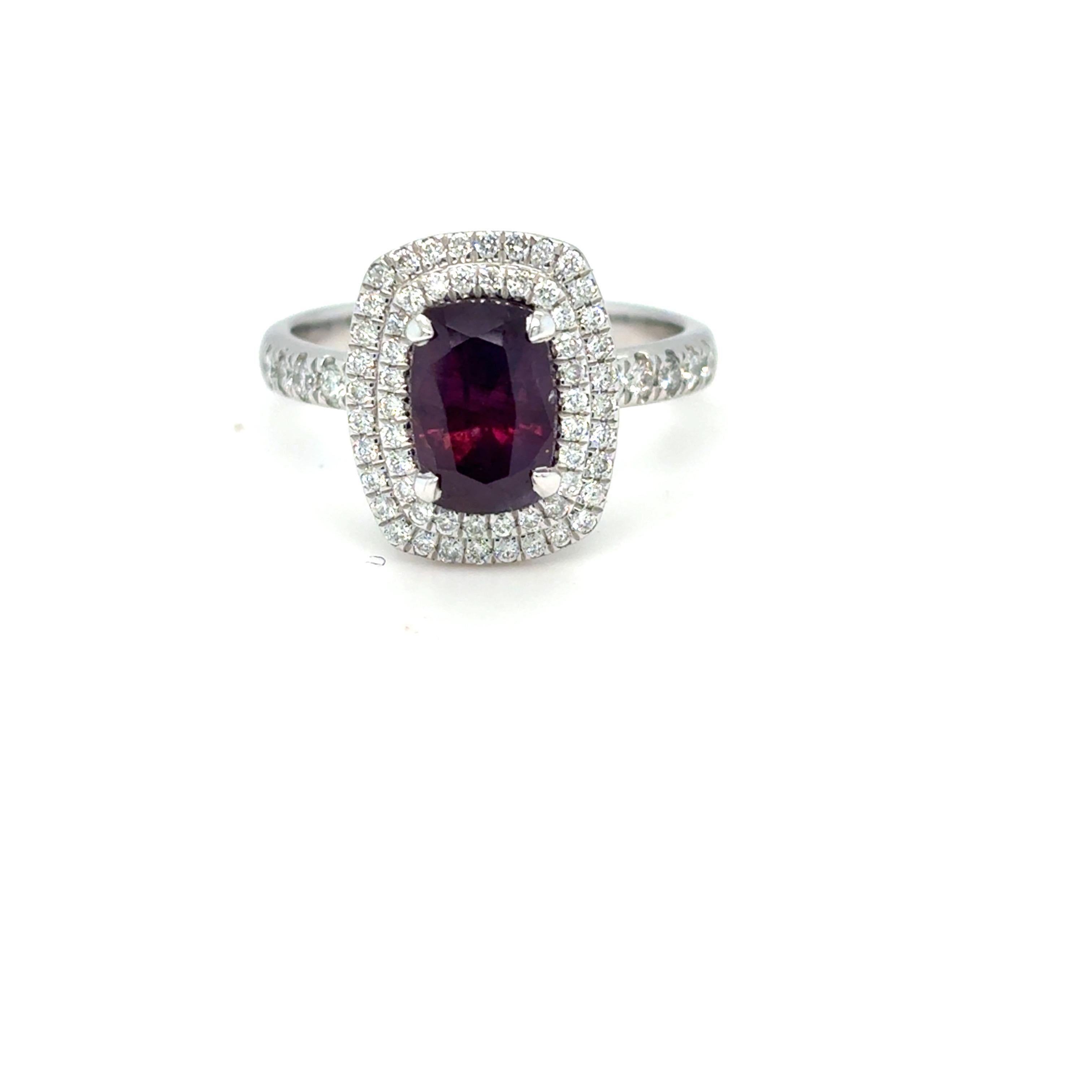 GIA Certified 2.30 Carat Cushion-Cut Kashmir Sapphire & Diamond Ring

This exquisite ring showcases a rare and highly sought-after 2.30 carat cushion-cut Kashmir sapphire, certified by GIA. The center stone is an unheated purple-pink sapphire, a