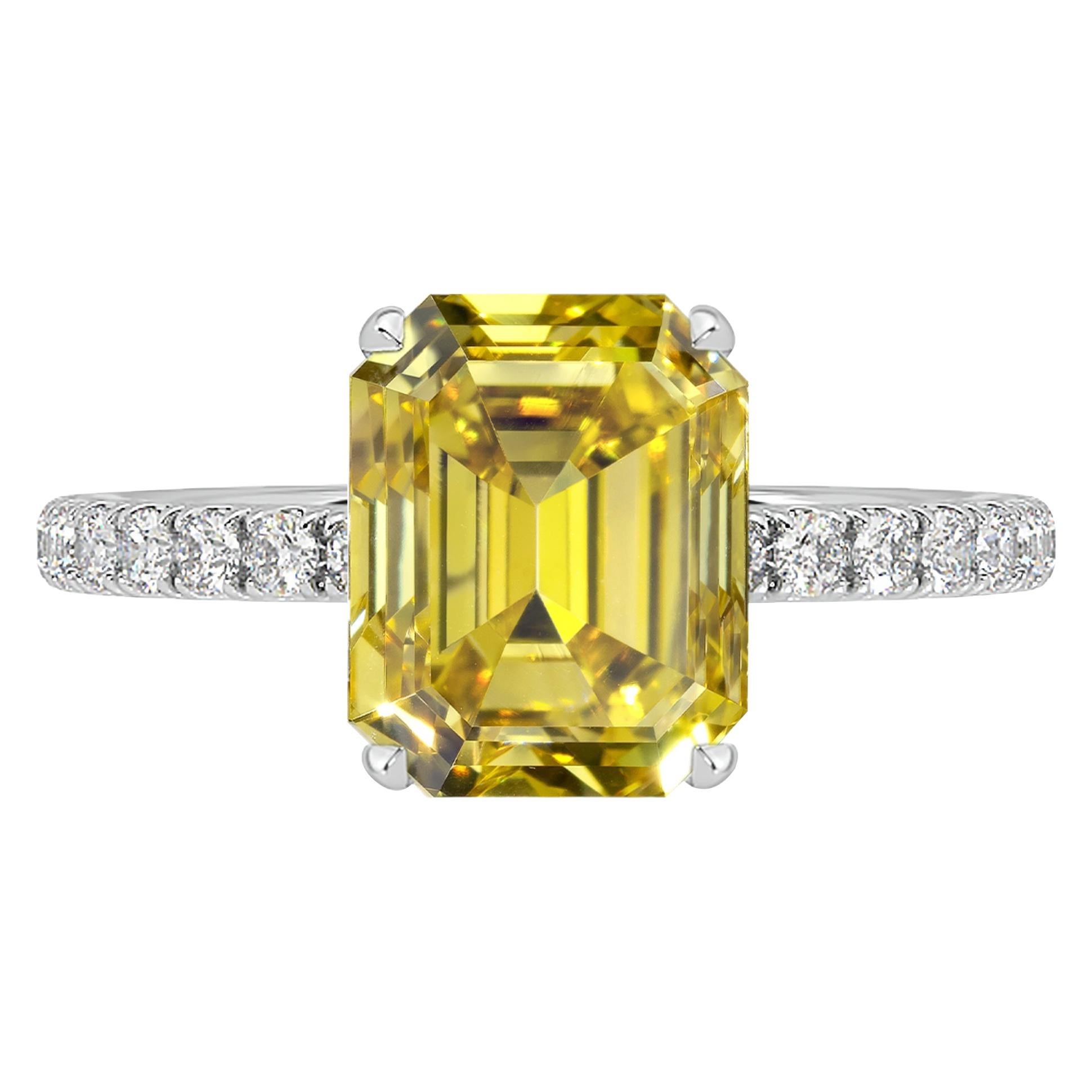GIA Certified 2.30 Carat Emerald Cut Yellow Diamond Ring For Sale