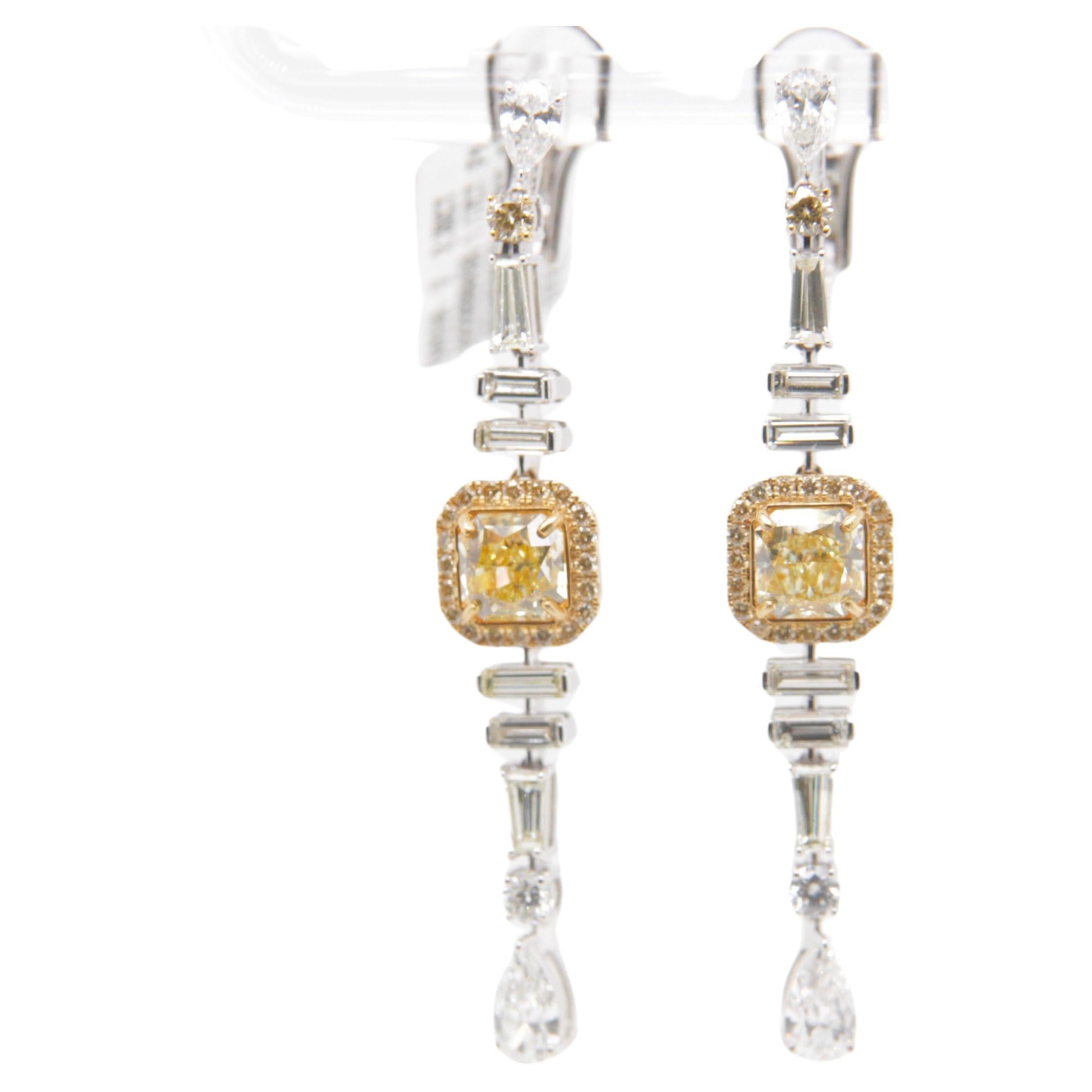GIA Certified 2.30 Carat Fancy Yellow Diamond Dangle Earrings in 18 Karat Gold For Sale
