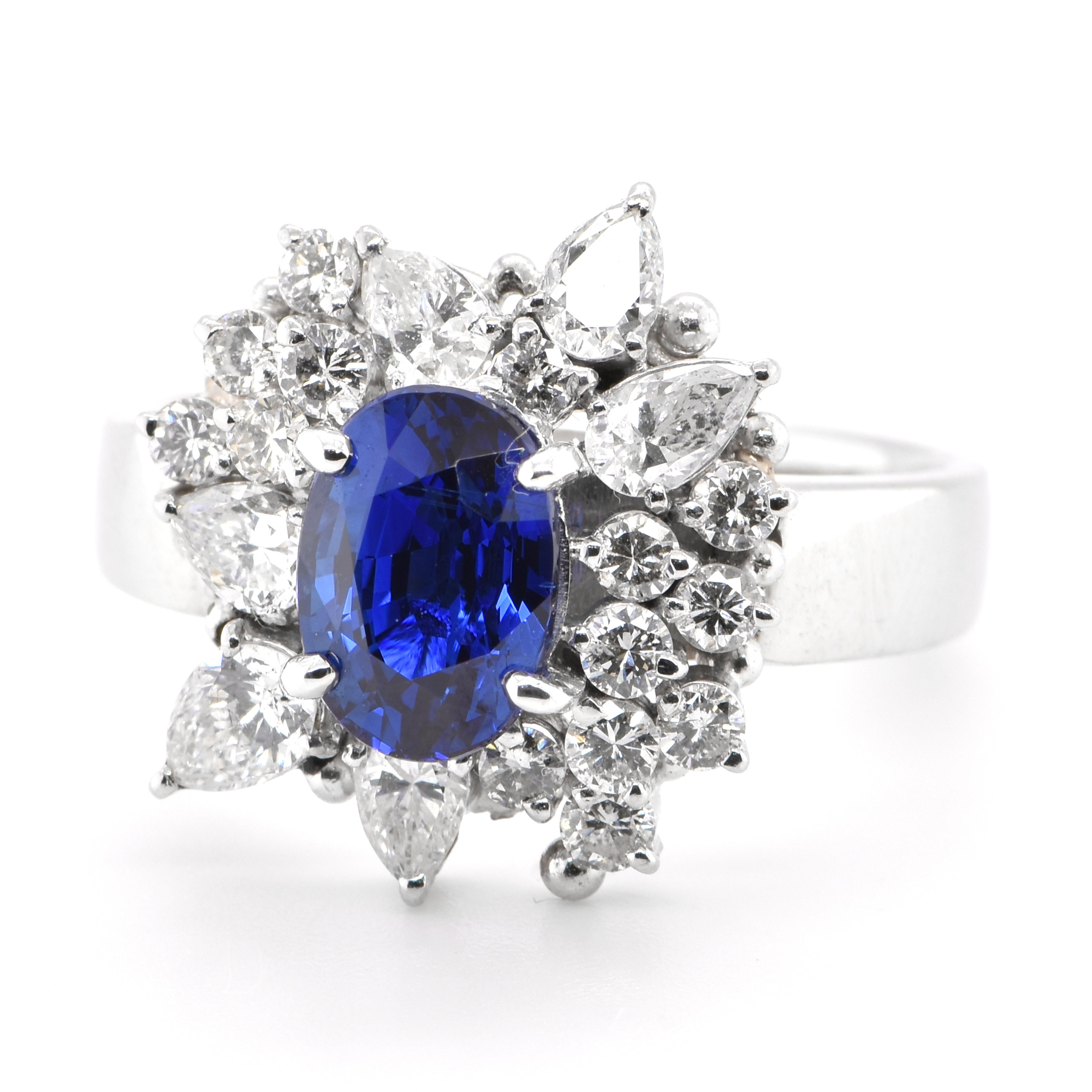 A beautiful Cocktail Ring featuring a GIA Certified Natural Madagascar Sapphire and 1.38 Carats Diamond Accents set in Platinum. Sapphires have extraordinary durability - they excel in hardness as well as toughness and durability making them very
