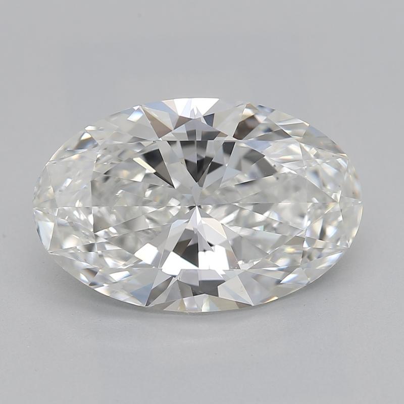 Dieser atemberaubende, in New York handgefertigte Diamantring besticht durch einen ovalen 2,30 Diamanten in der Mitte, der mit außergewöhnlicher Brillanz und Feuer strahlt und mit G und VS1 bewertet ist. Der Diamant ist sicher in einer erhöhten