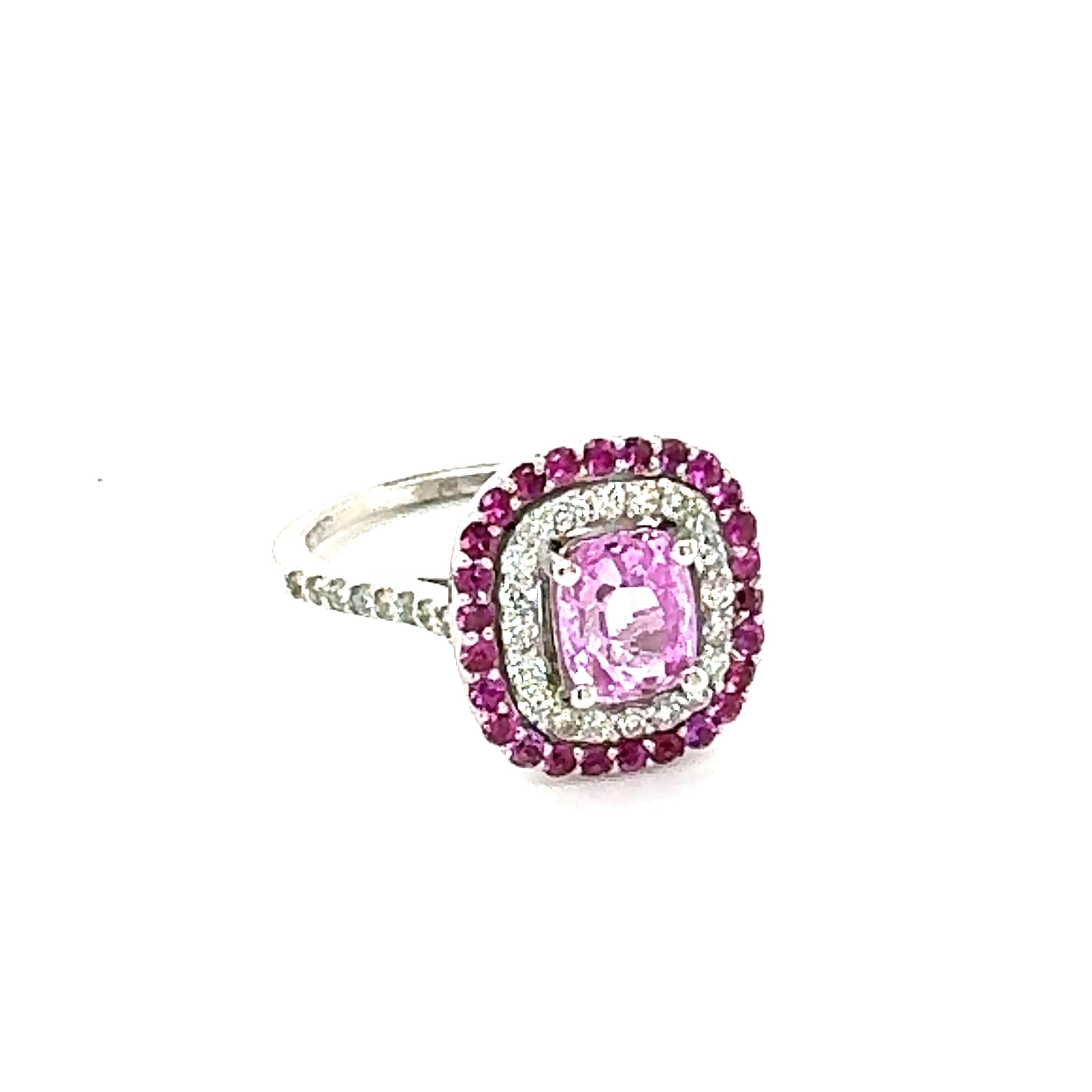 Simply the most elegant and beautiful Pink Sapphire and Diamond Engagement or Wedding Ring!
GIA Certified 2.32 Carat Cushion Cut Pink Sapphire Diamond White Gold Ring

The center Cushion Cut Pink Sapphire is 1.47 Carats and is surrounded by a halo