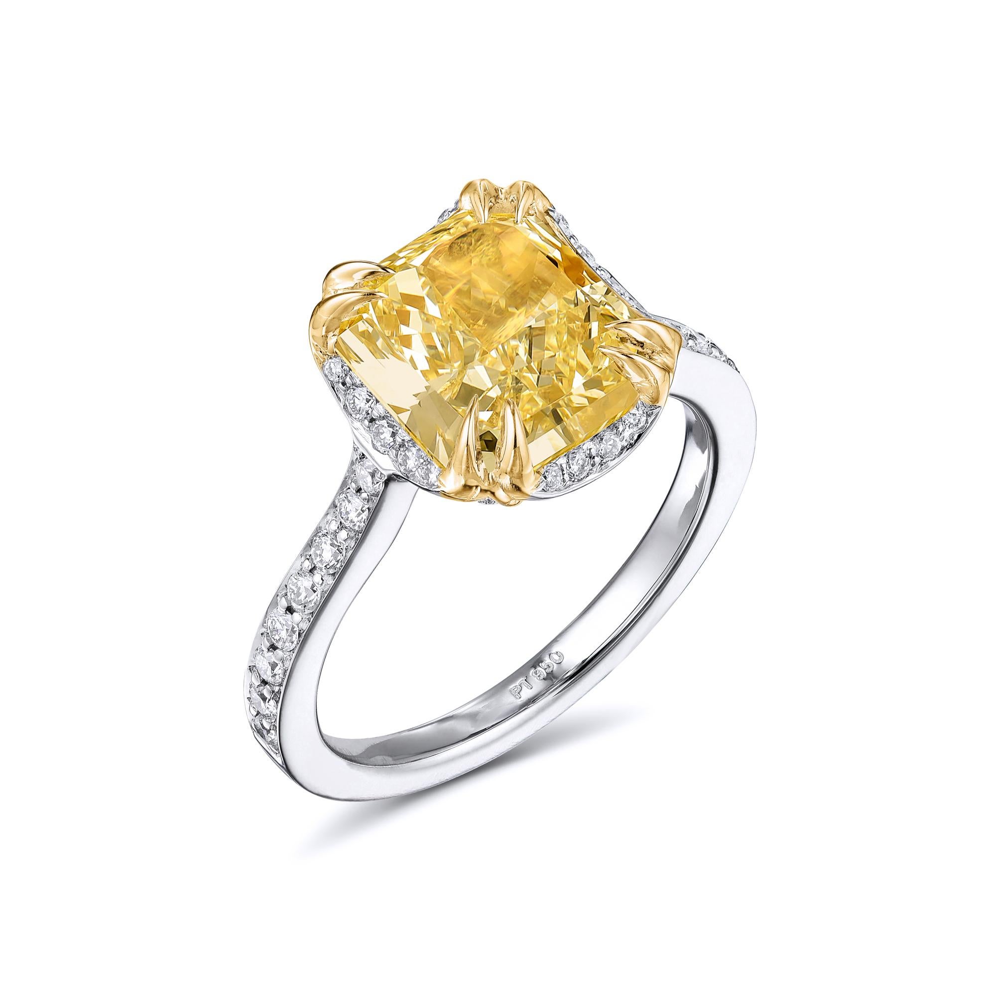 Diamond ring with GIA certificate, no.5161627817. Center stone: 2.33ct/ VS2 radiant cut light to Fancy light yellow diamond, 8.47x 7.26 x 4.60 mm. Side stone .50 ct brilliant round diamonds  G-H / VS1-SI2. Total carat weight : 2.83ct. EGL Report