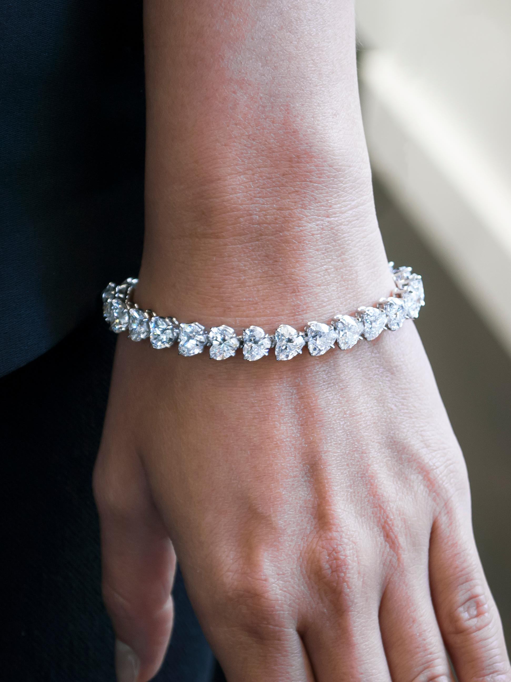 This incredible, one-of-a-kind diamond tennis bracelet from the vaults of J. Birnbach is for the true jewelry connoisseur... Featuring 26 GIA Certified Heart Shape diamonds = 23.65 carat total weight, D - G in color, IF - VS2 in clarity. The