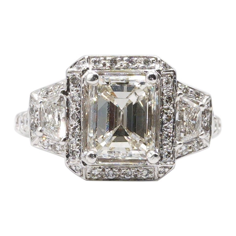 GIA Certified 2.39 Carat Emerald Cut Diamond & Trapezoid Diamond Engagement Ring For Sale