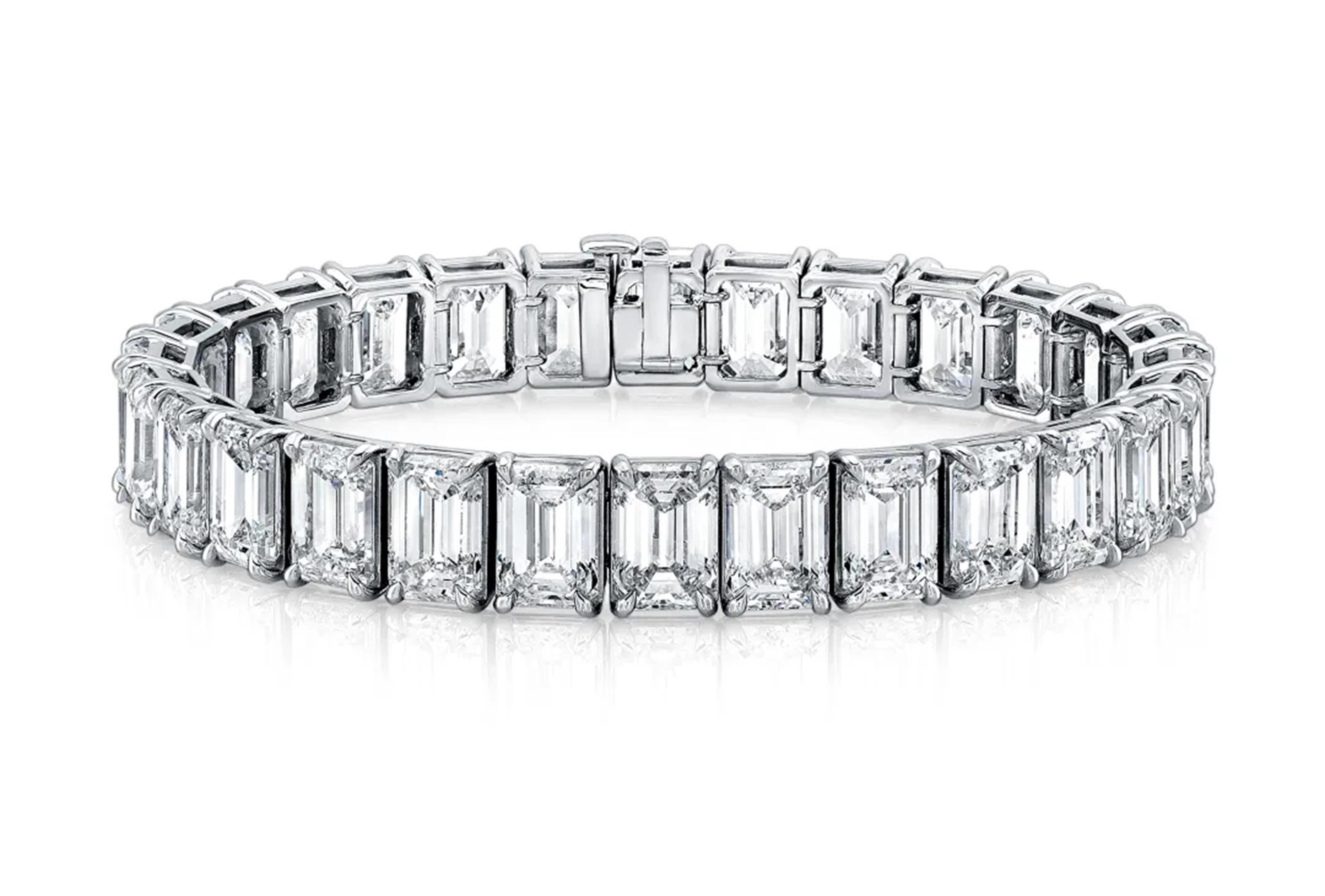 Discover unparalleled sophistication with this majestic bracelet, featuring a flawless assembly of 25.5 carats of 42 GIA-certified emerald cut diamonds, each boasting exceptional D-E-F color grades and clarity ranging from VVS2 to VS2. Every