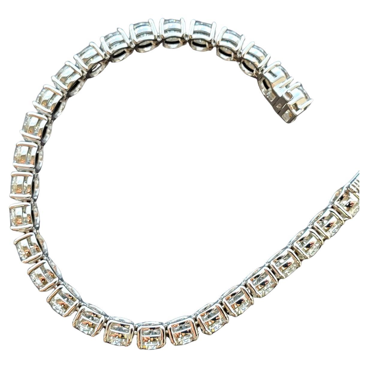 Modern GIA Certified 24 Carat White Brilliant Cut Tennis Diamond Bracelet For Sale