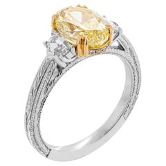 GIA Certified 2.40 Carat Fancy Yellow Oval Cut Three-Stone Ring