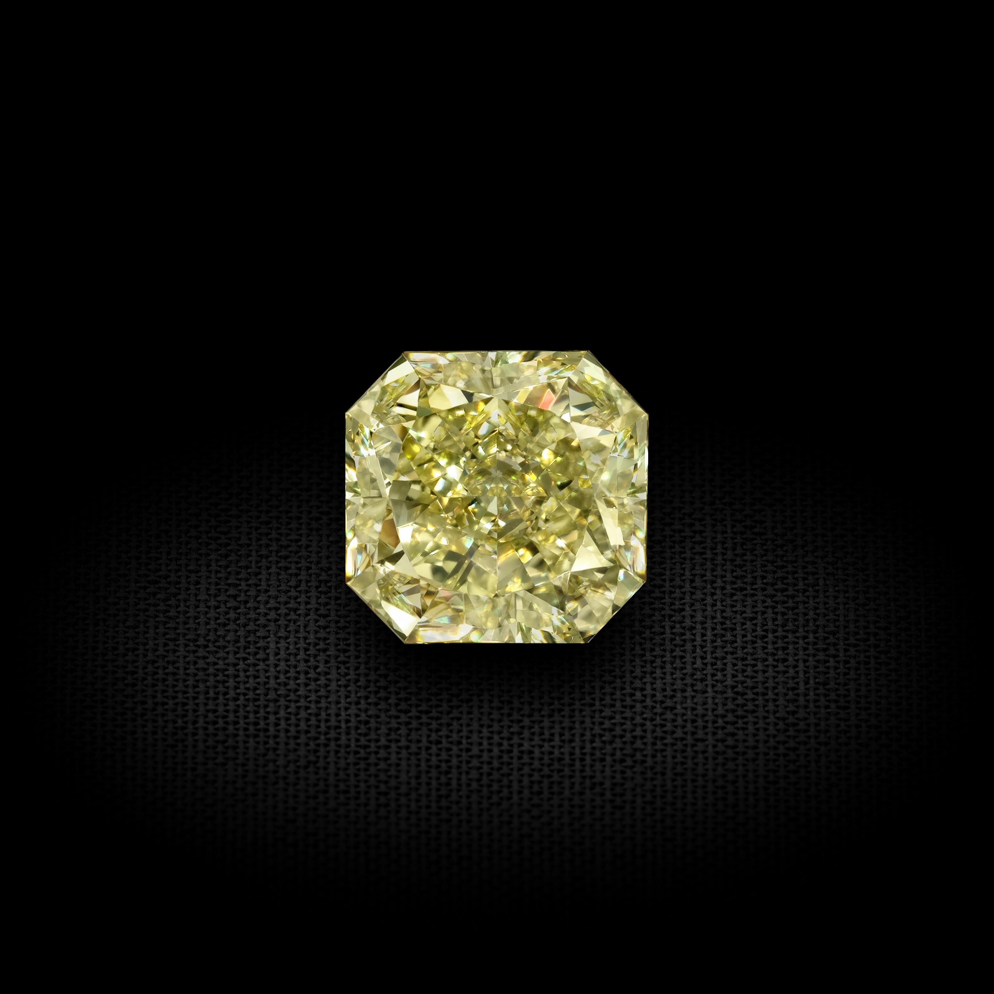 GIA Certified 2.40 Carat Radiant Cut Yellow Diamond Ring In New Condition For Sale In New York, NY
