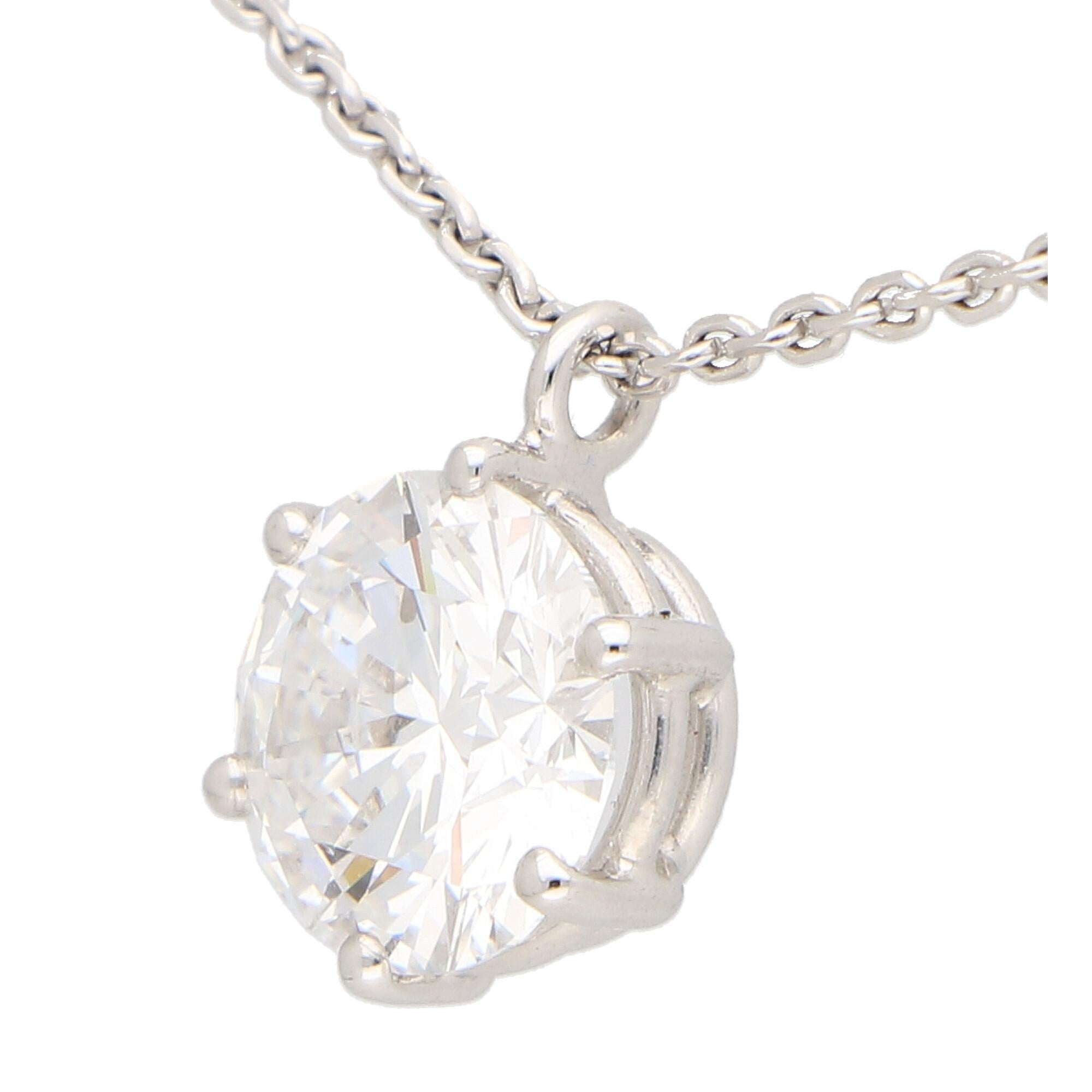A beautiful GIA certified round brilliant cut single stone diamond pendant set in 18k white gold.

The necklace solely features a spectacular 2.40ct round brilliant cut diamond which is securely set in a six claw open gallery setting. The true