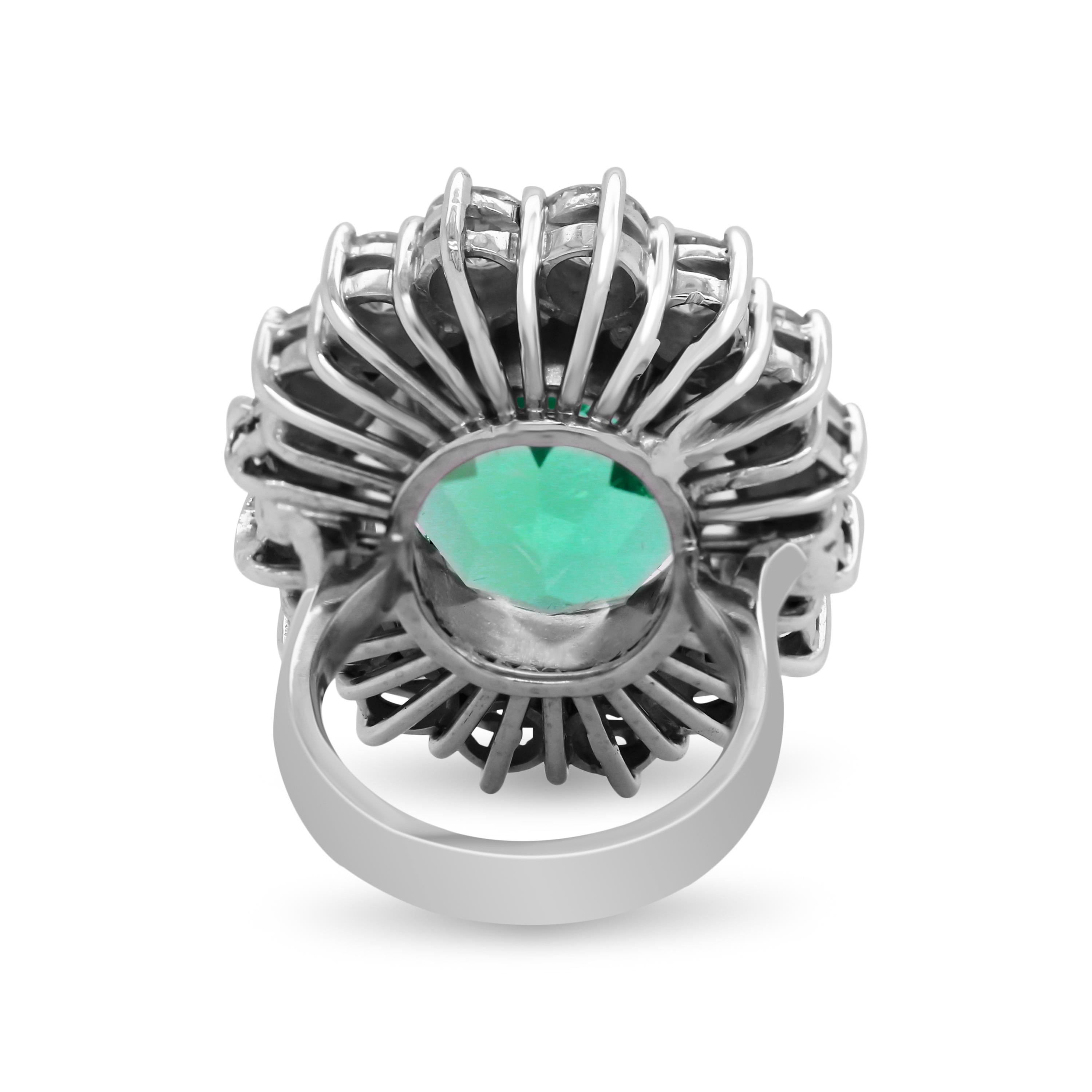 Oval Cut GIA Certified 24.13 Carat Oval Colombian Emerald and Diamond White Gold Ring