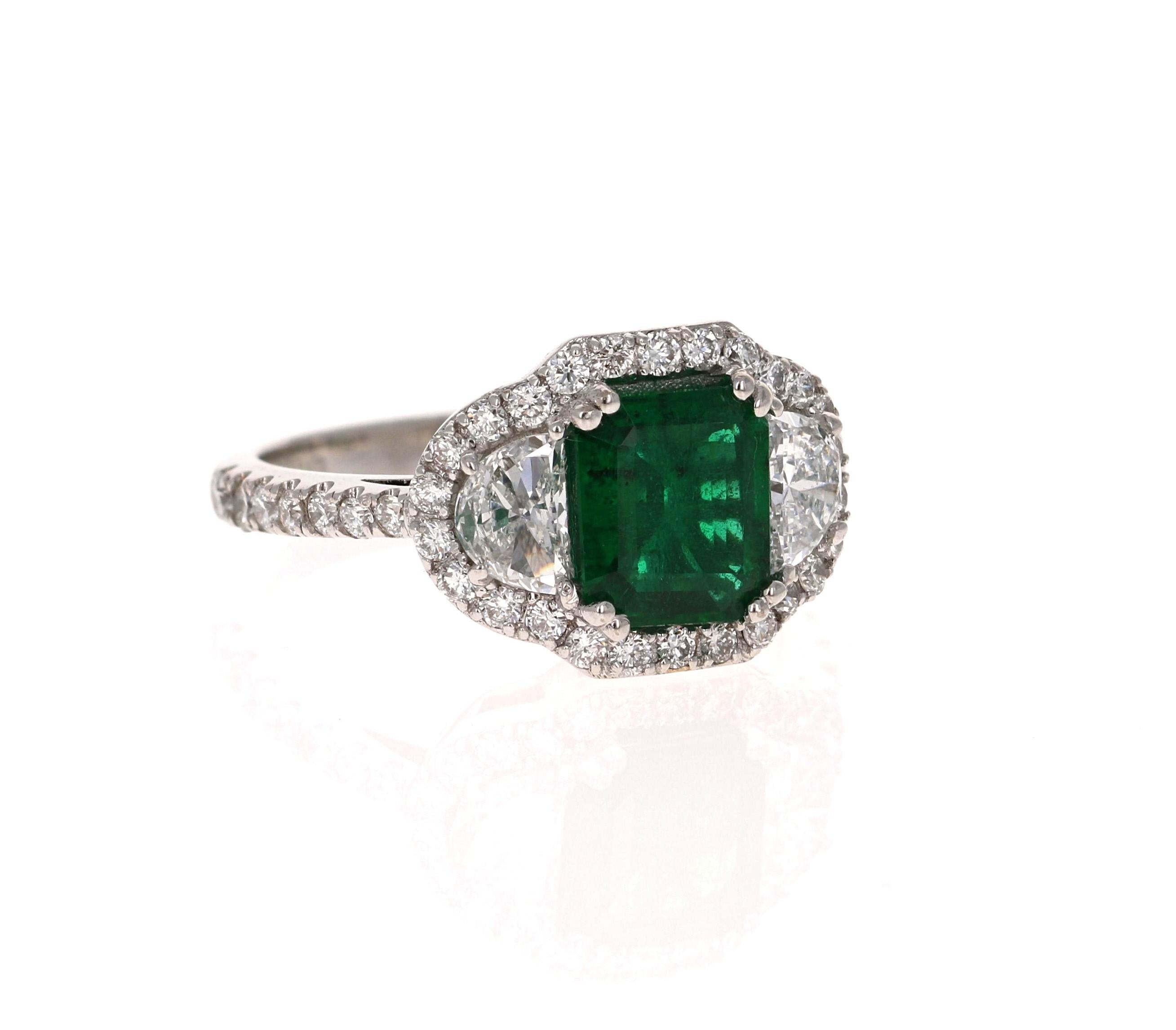 Contemporary GIA Certified 2.42 Carat Emerald Diamond 18 Karat White Gold Three Stone Ring For Sale